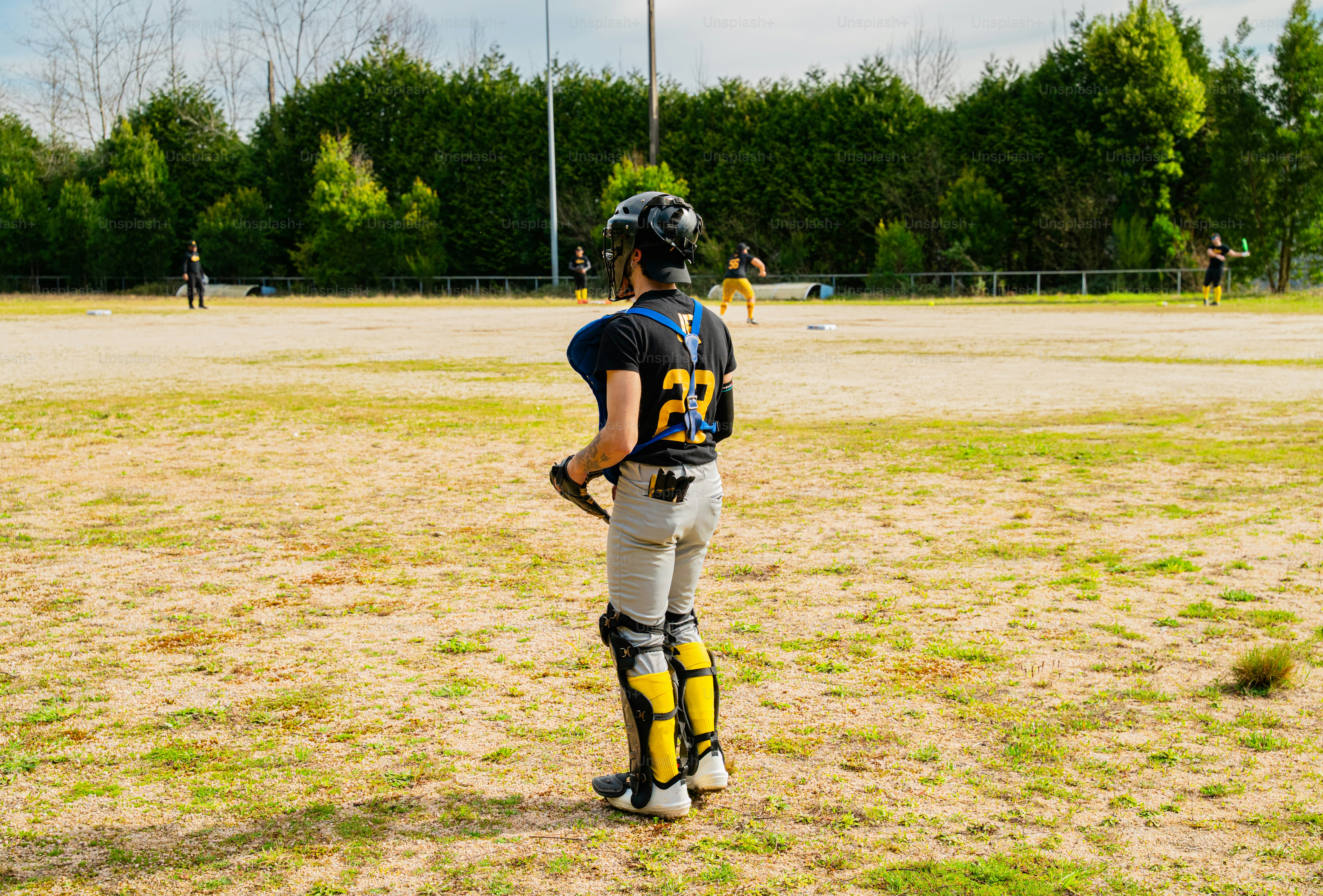 A young baseball player in uniform on the field. photo – Sport Image on ...