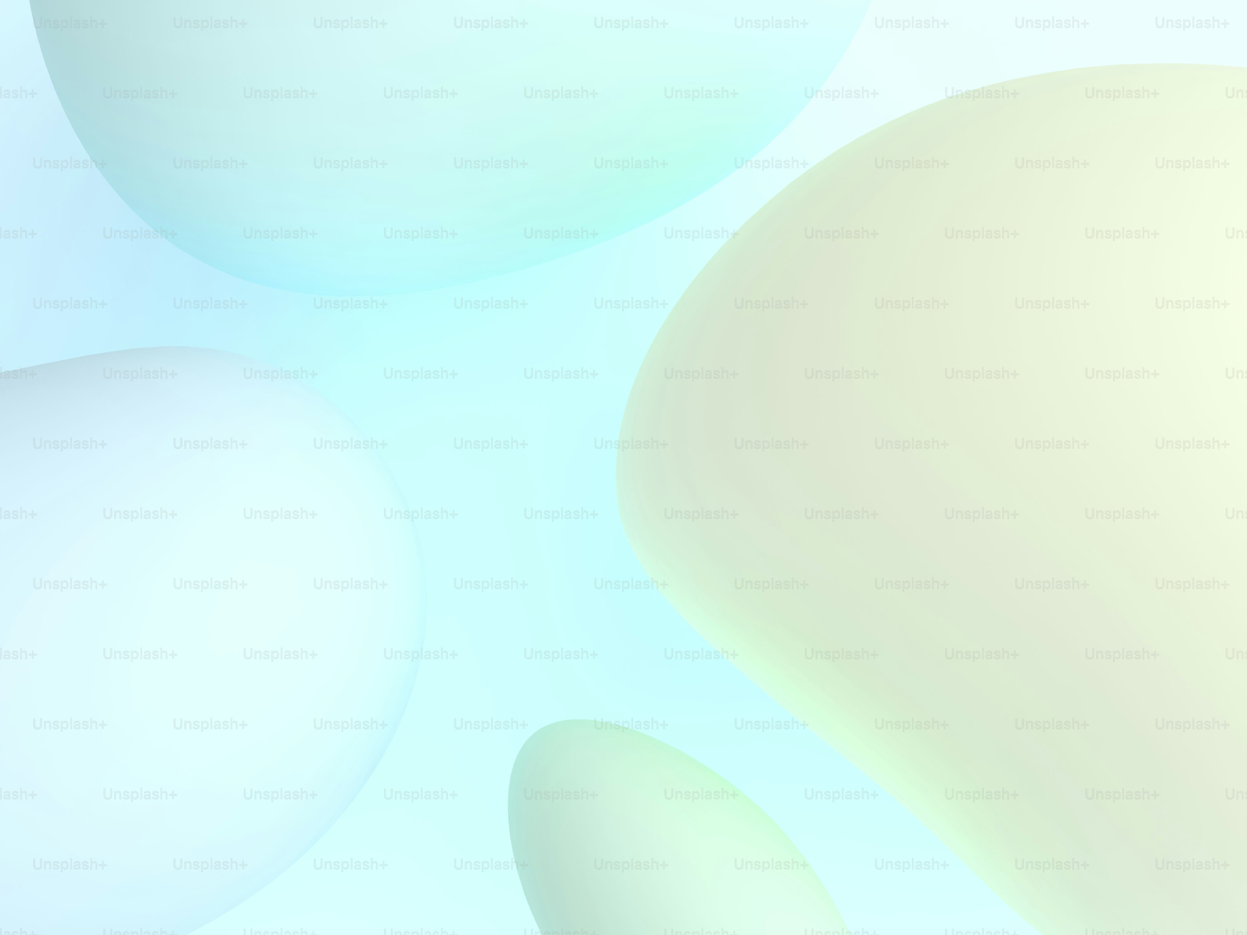 Soft, pastel-colored blobs on a light blue background