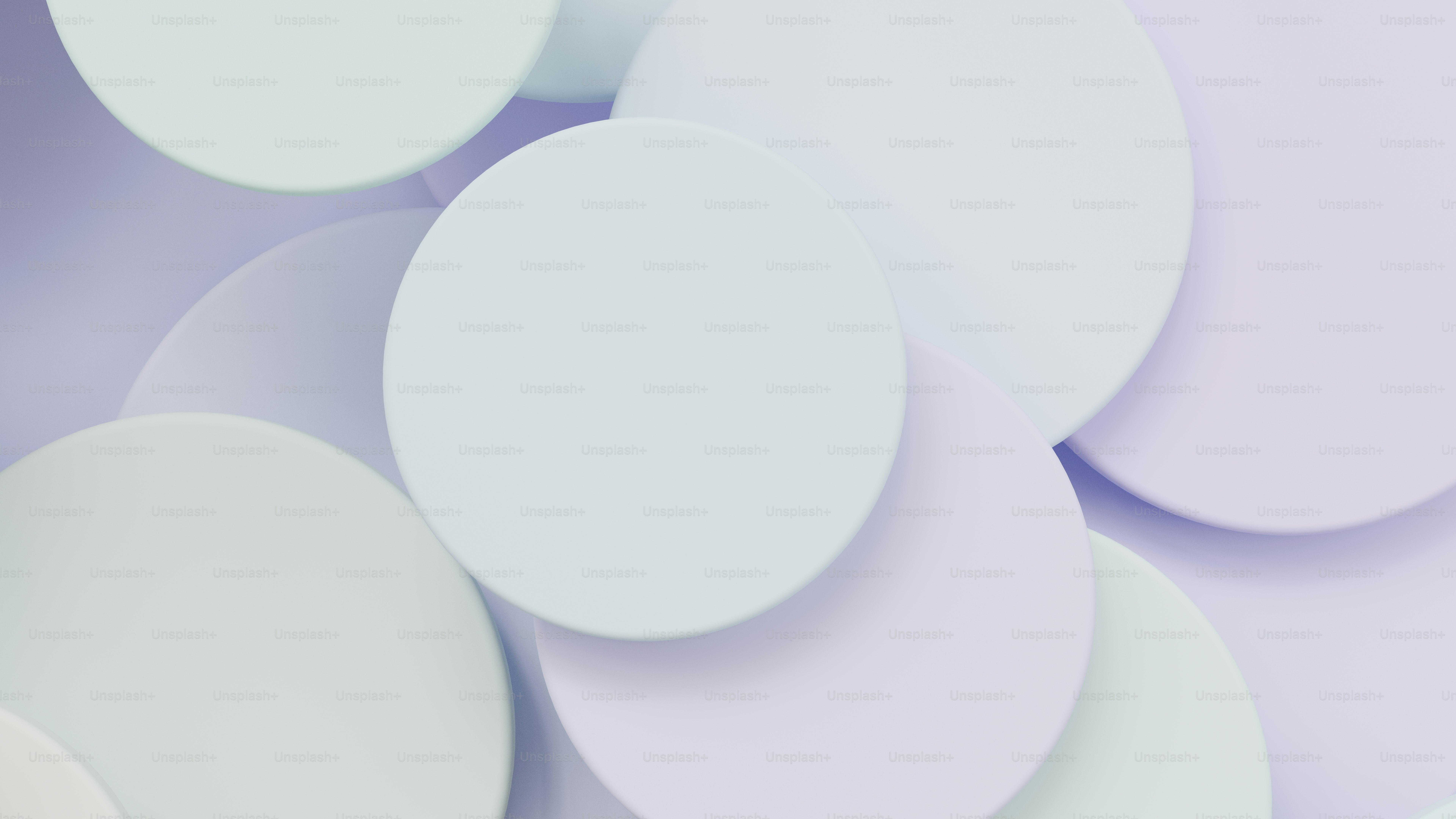 Lingkaran pastel lembut tumpang tindih dengan latar belakang terang