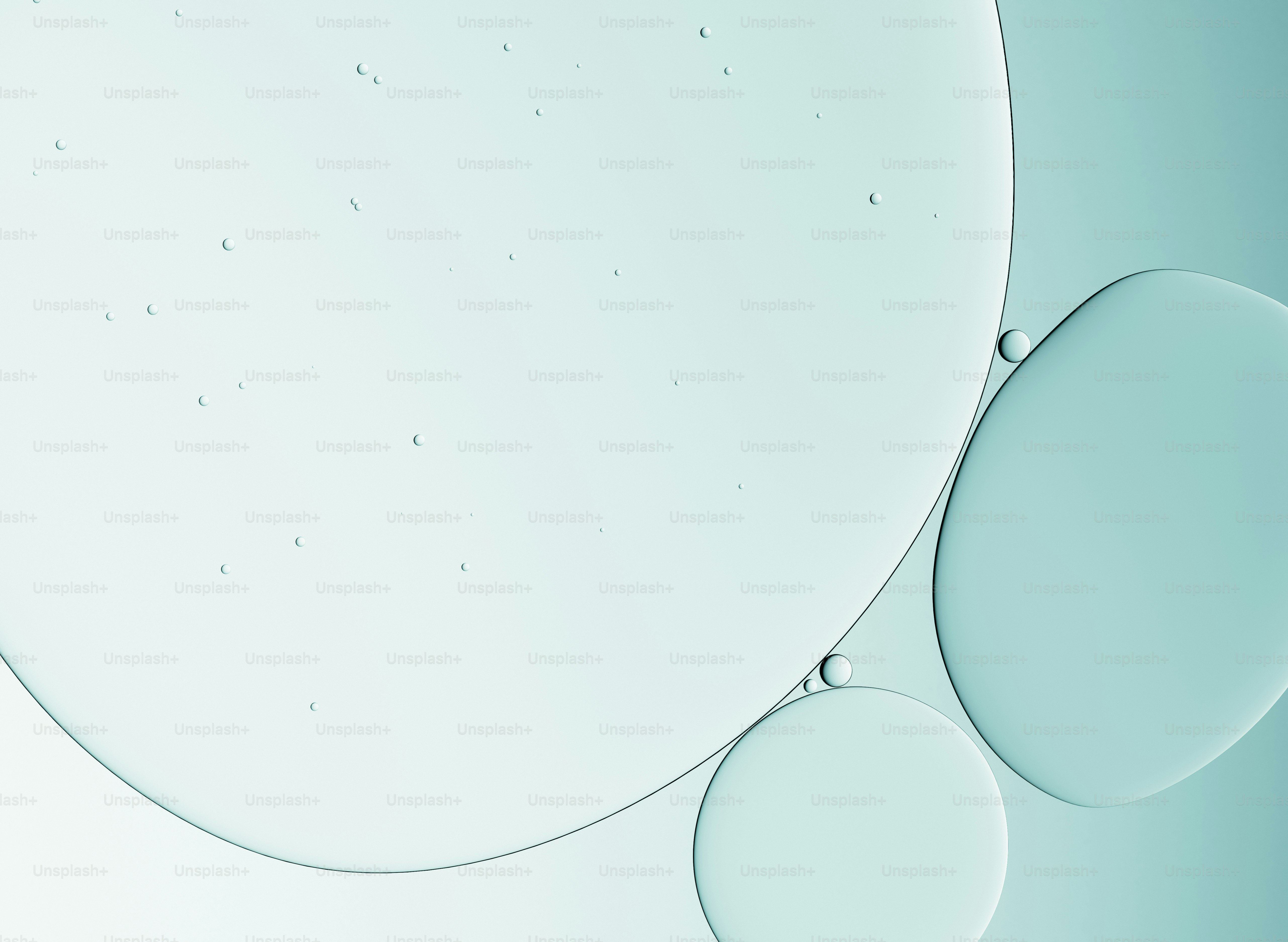 Abstract light blue bubbles and circles on a gradient background.