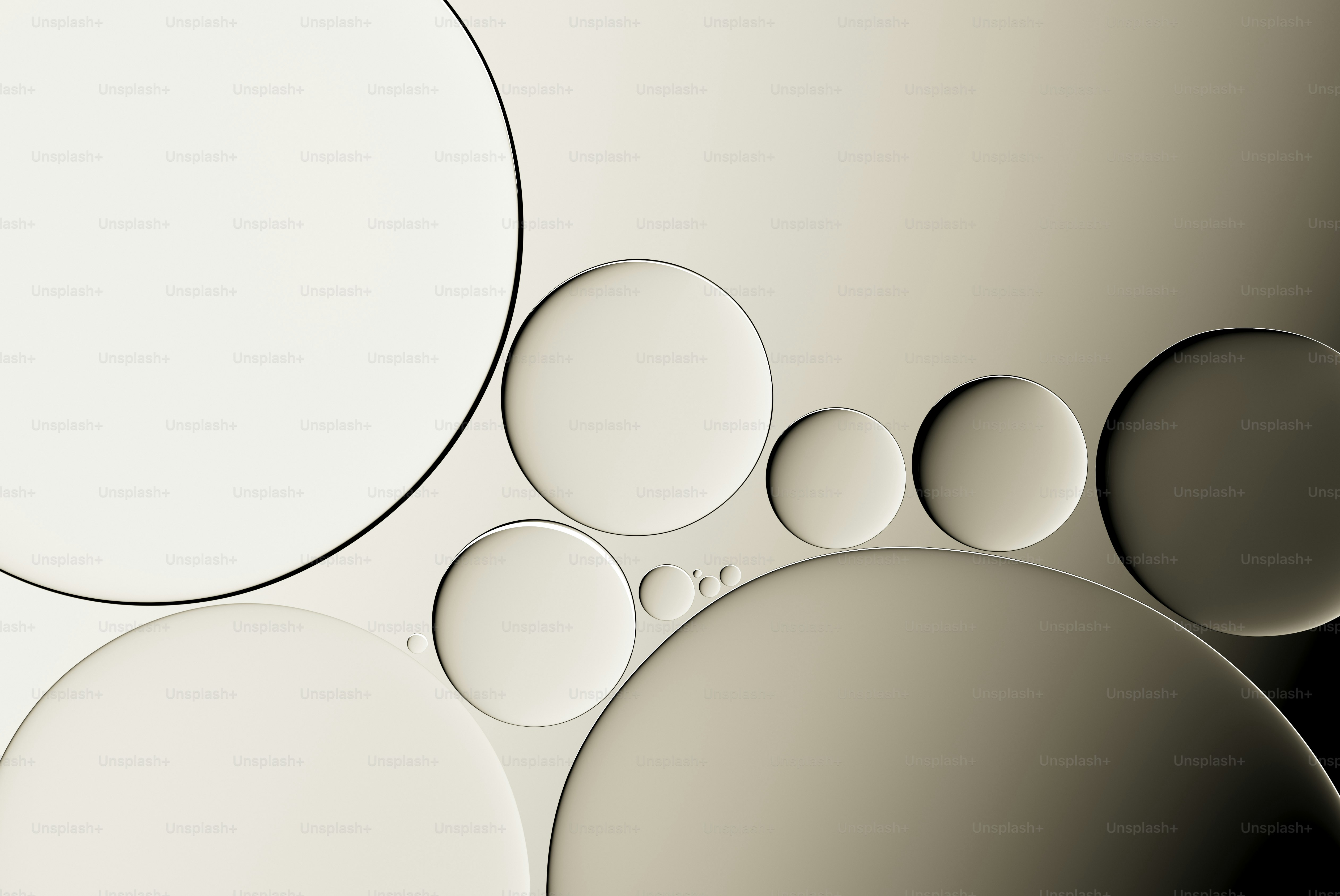 Close-up of oil and water bubbles on a white background