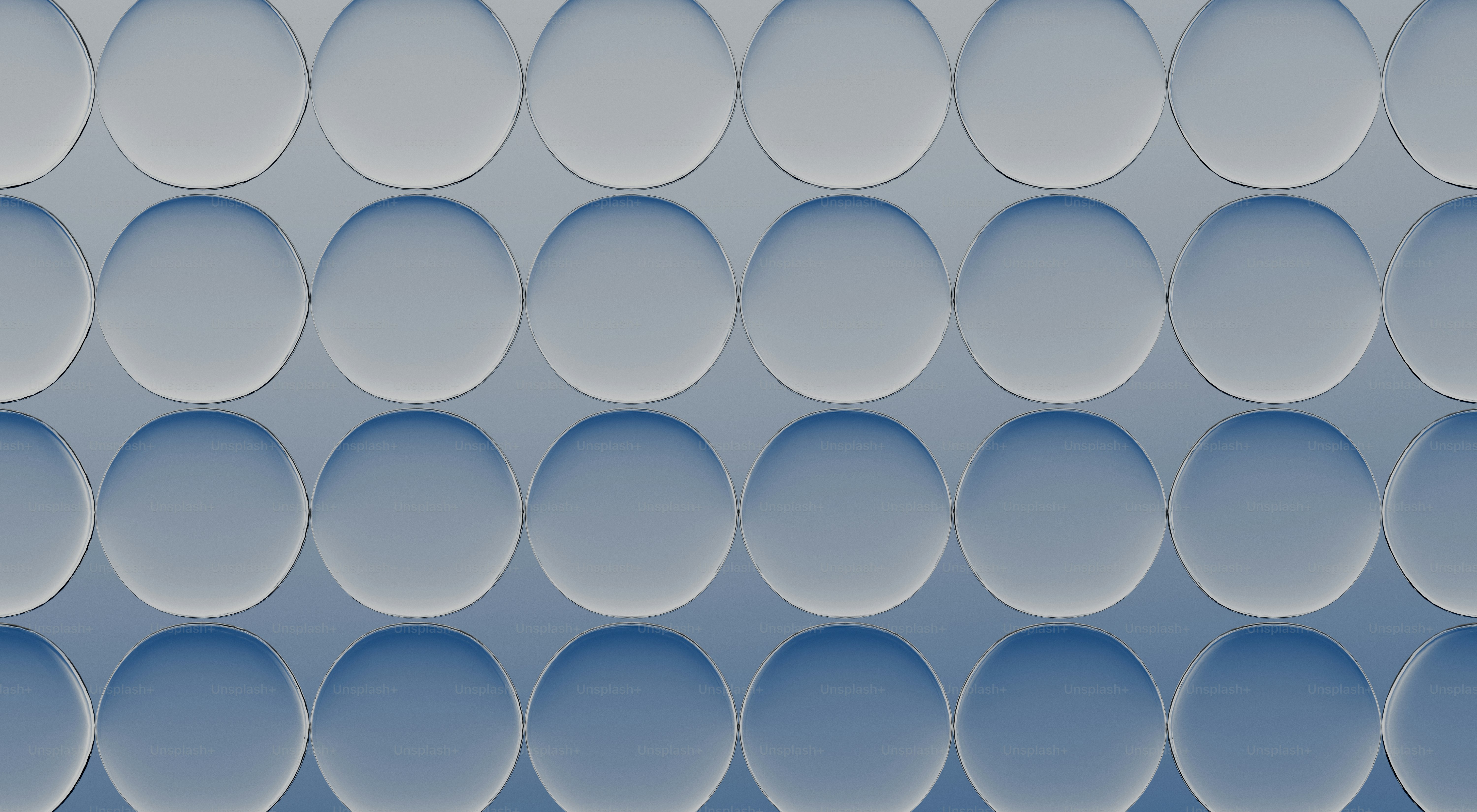 Rangées de cercles bleu clair sur un fond texturé