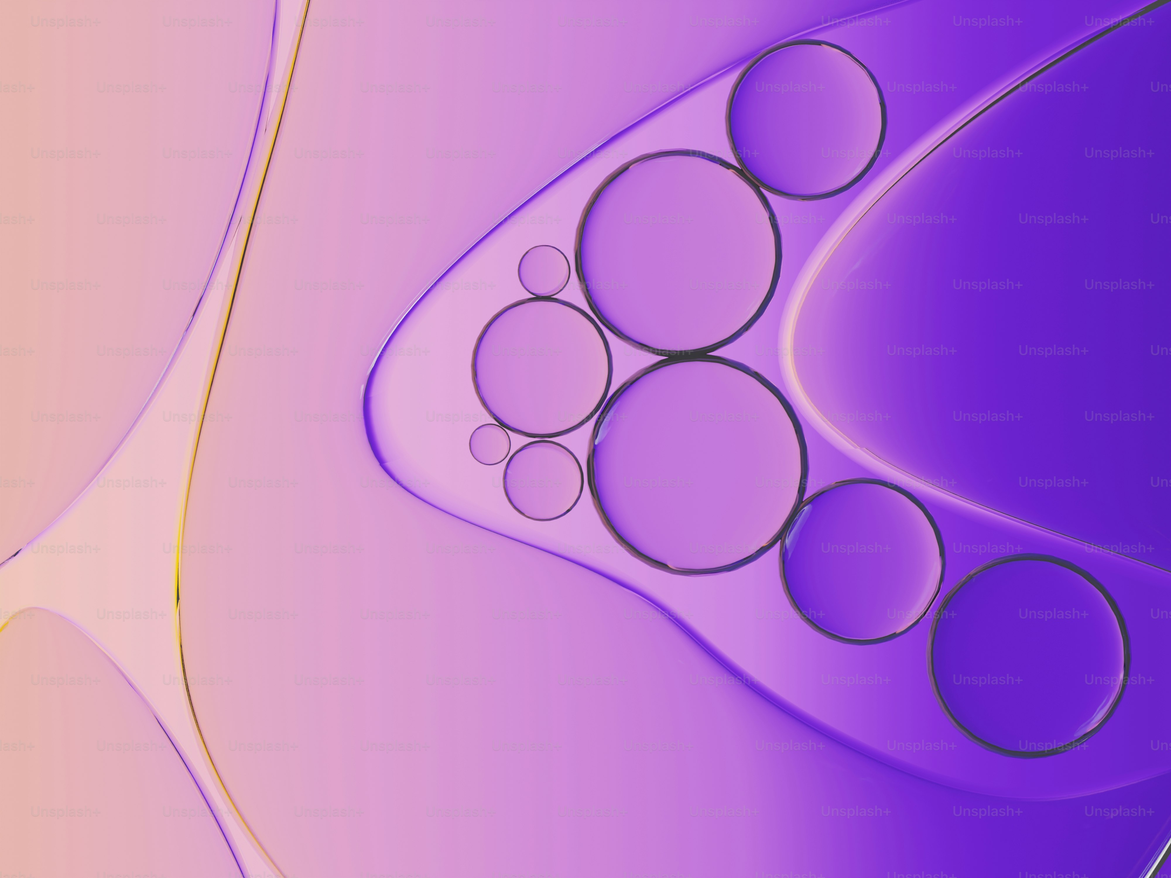 抽象的な紫とピンクの液体に浮かぶ泡。