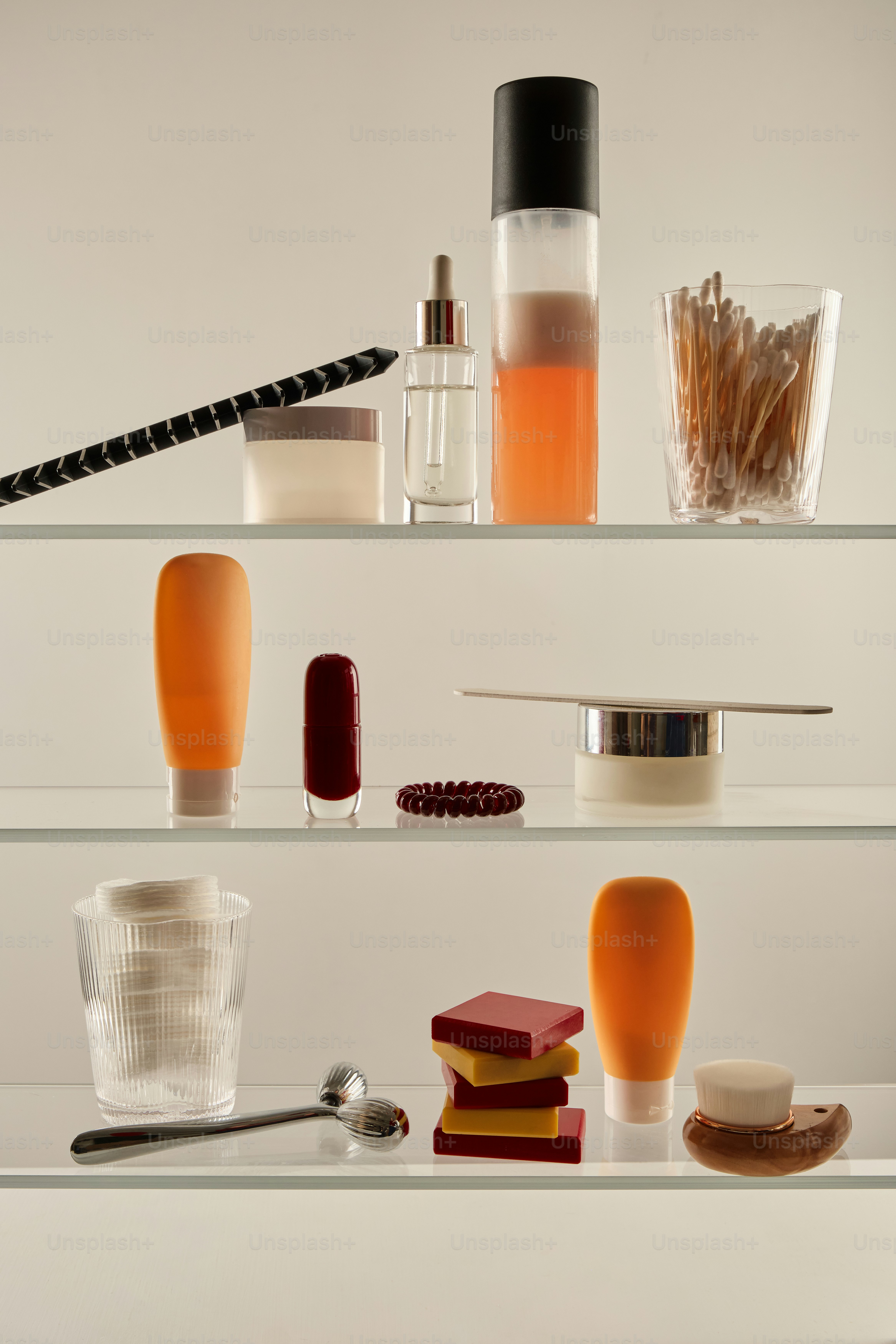 Minimalist beauty products arranged neatly on a bathroom shelf for a simple routine