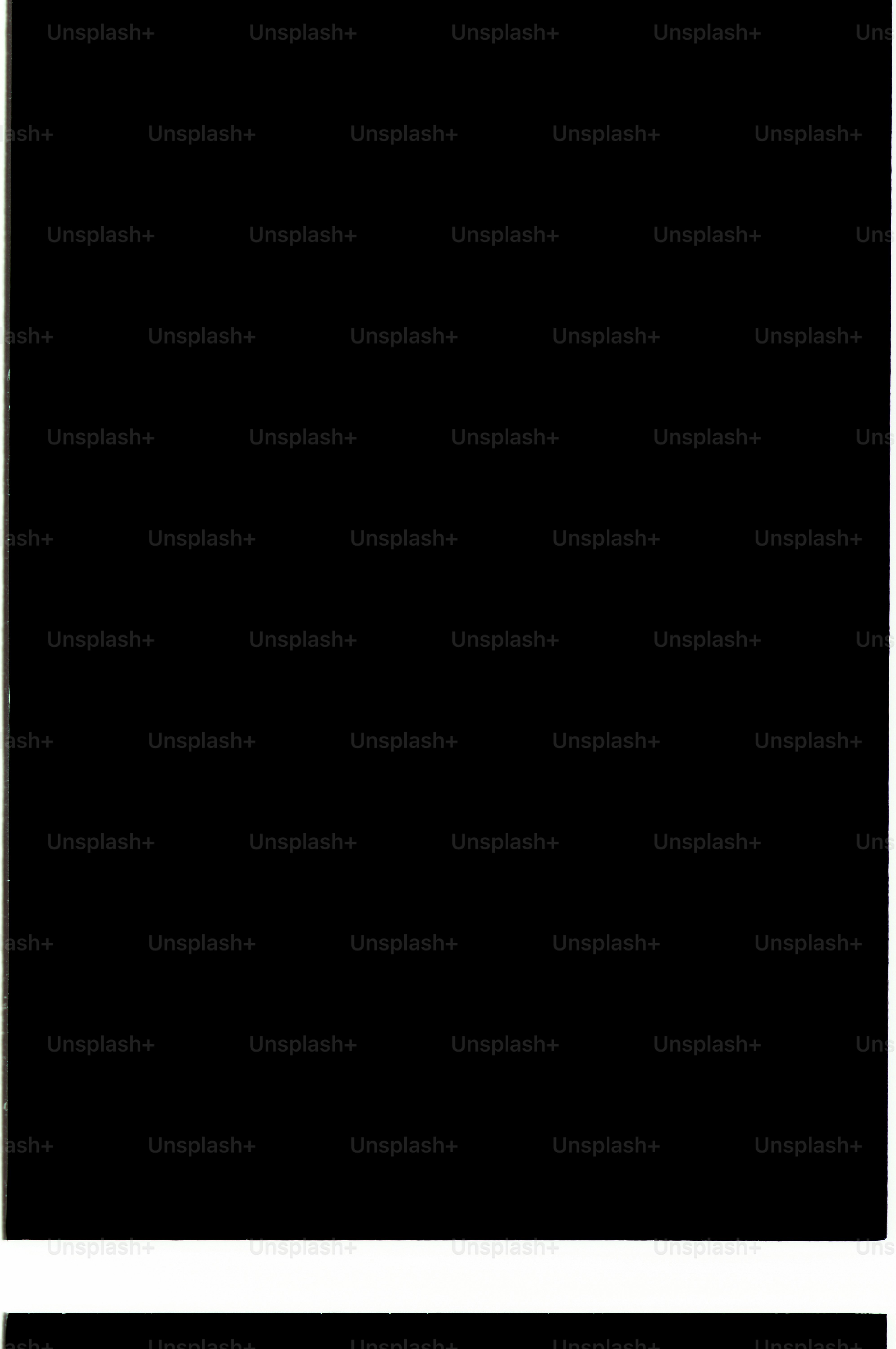 Solid black background with a white stripe