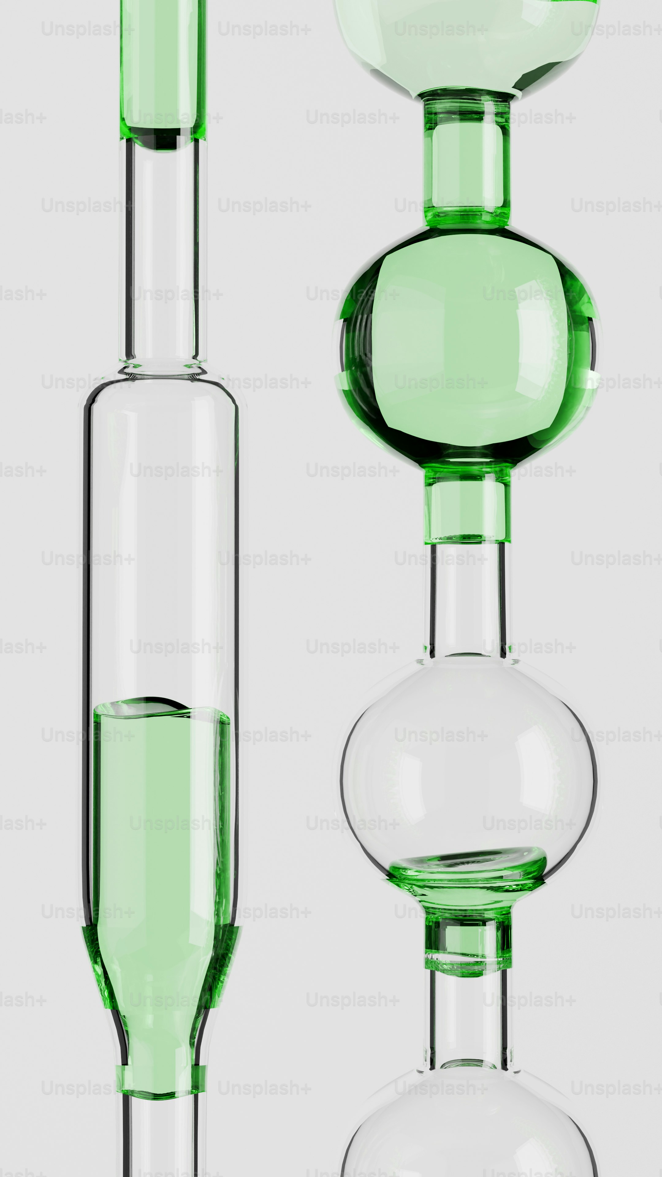 Dua tabung kaca dengan cairan hijau dengan latar belakang putih