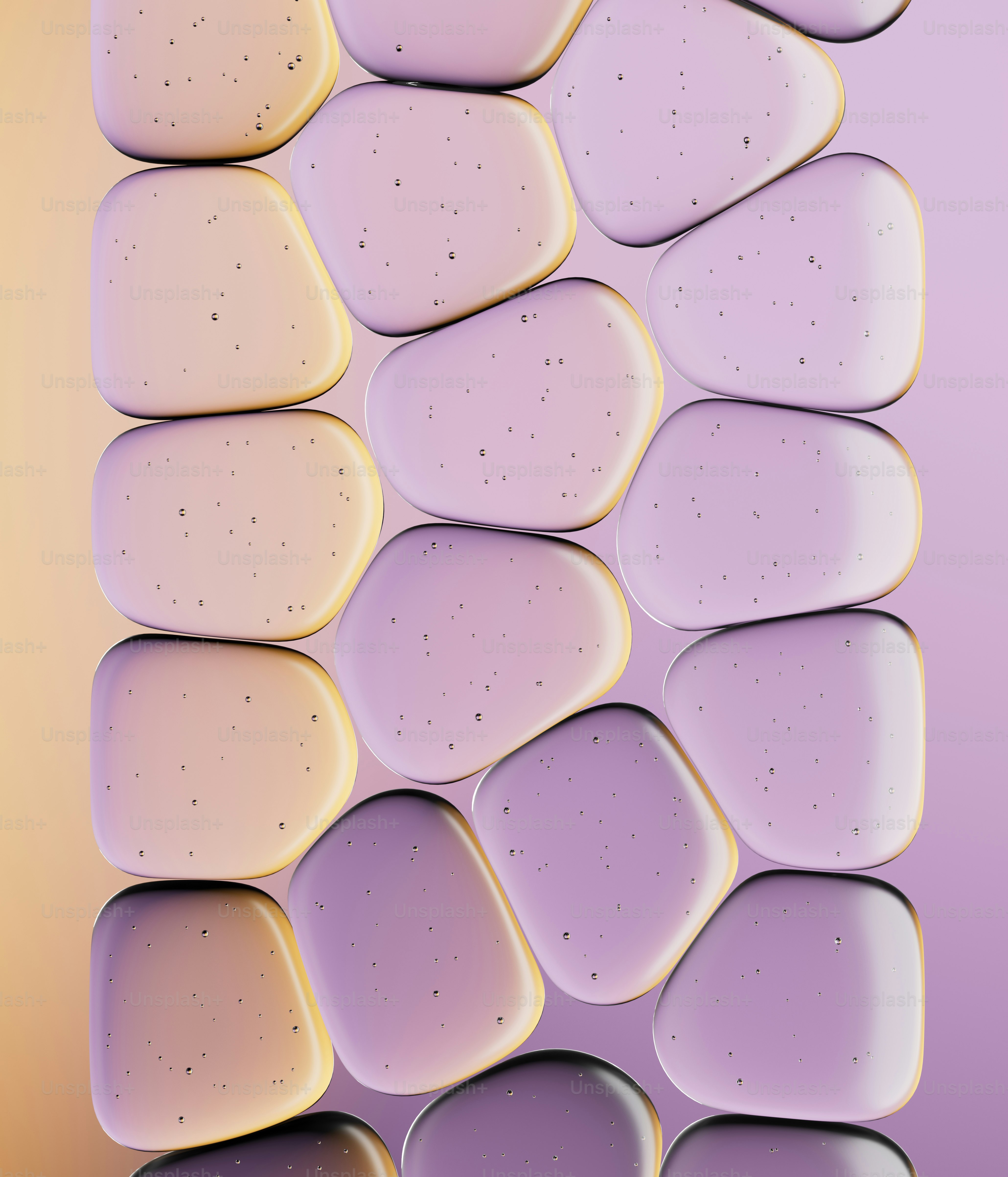 Batu halus dan bulat dalam warna pastel yang disusun secara vertikal.