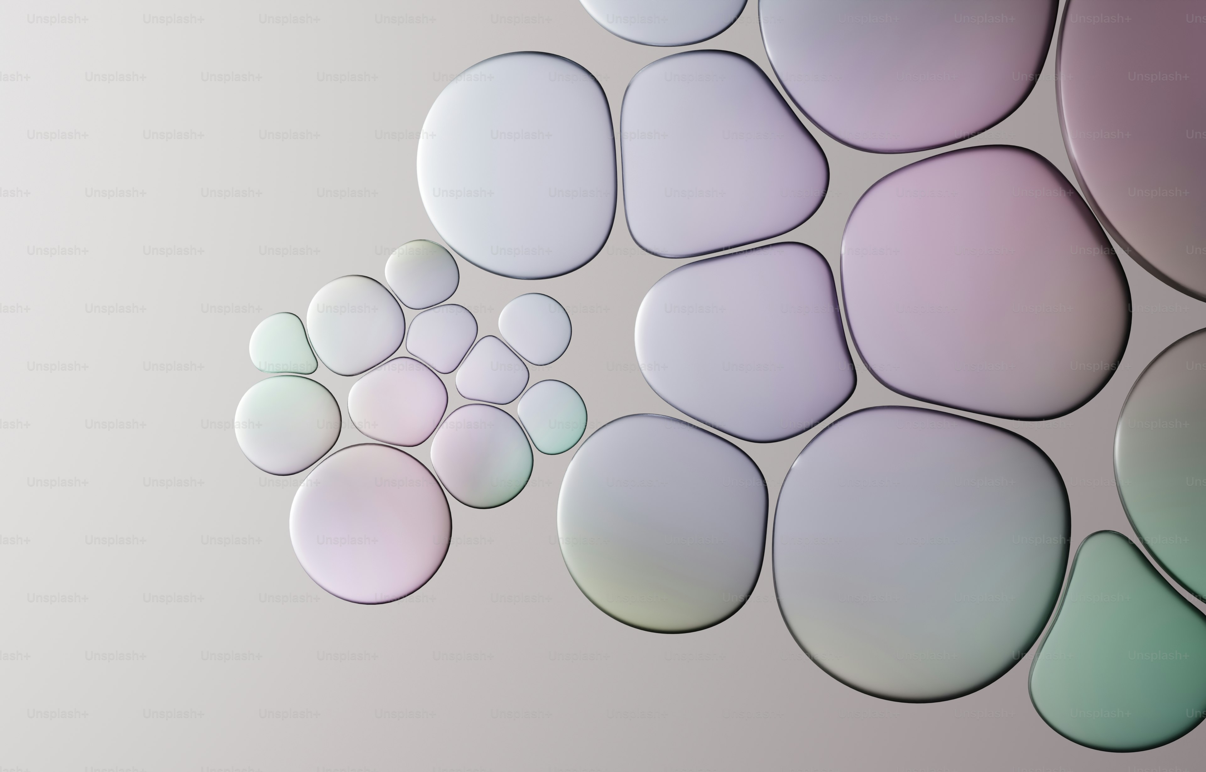 Gros plan de bulles iridescentes formant un motif en spirale.