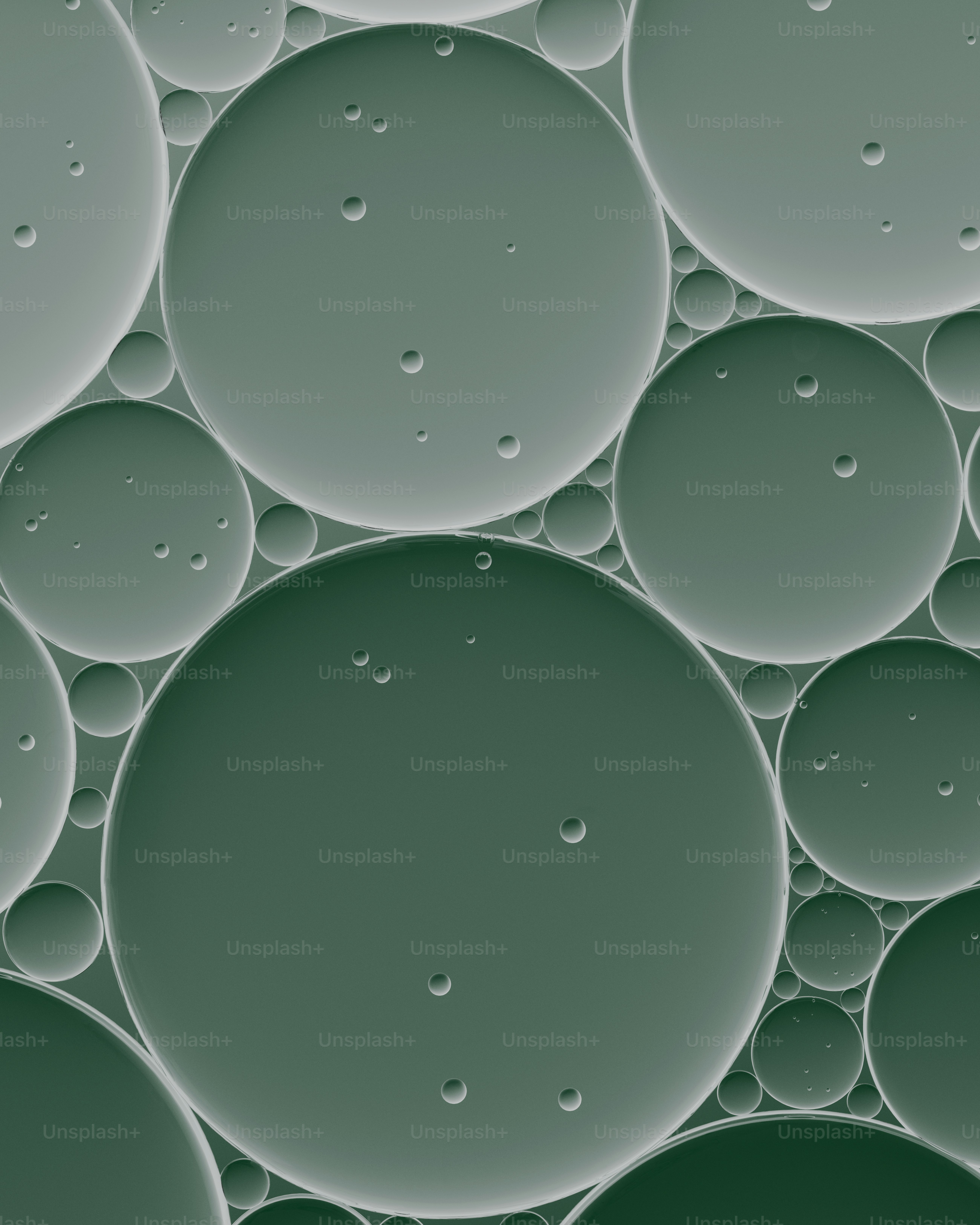 Motif abstrait de cercles verts avec de petites bulles.