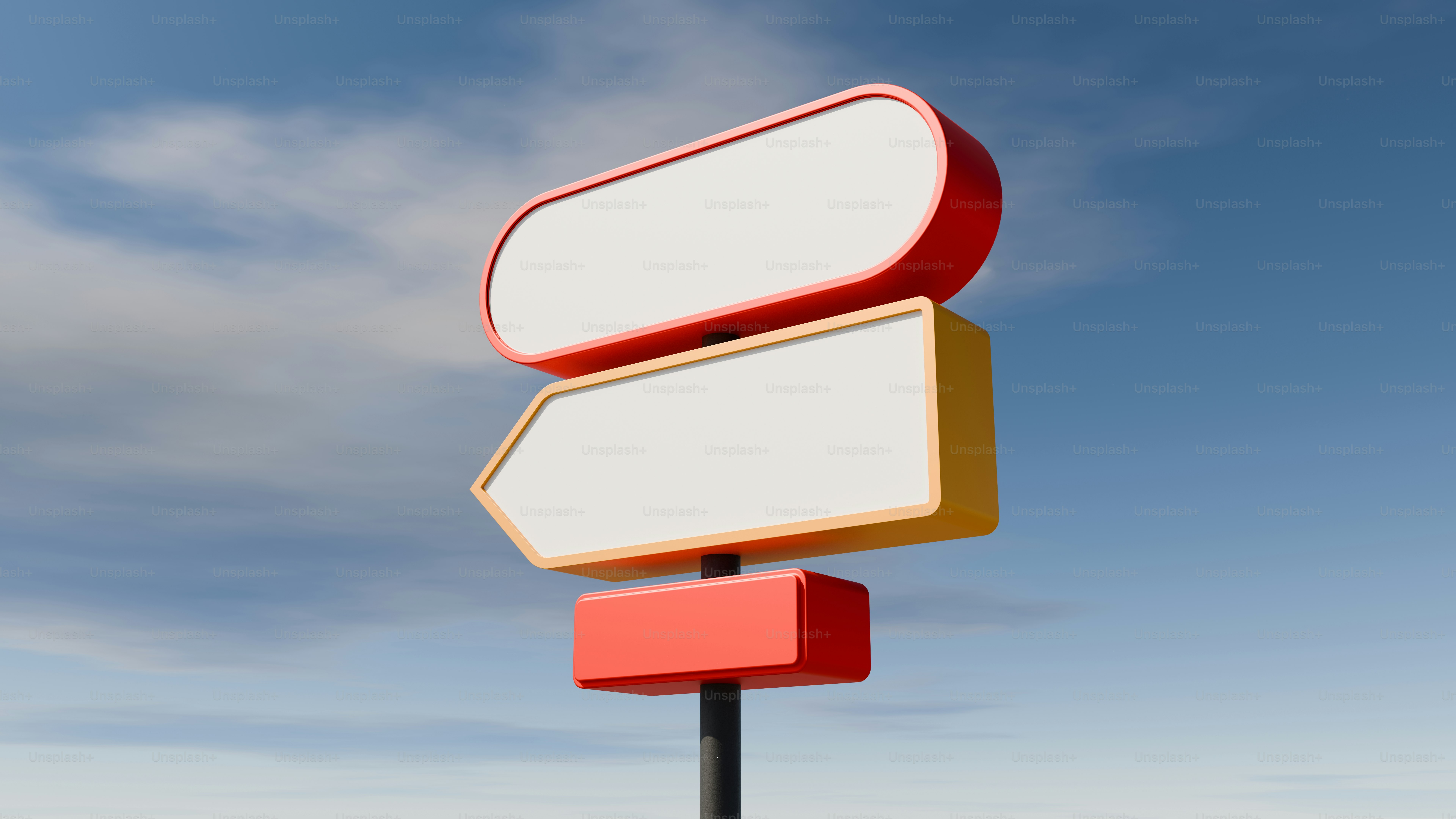 Blank road signs against a blue sky