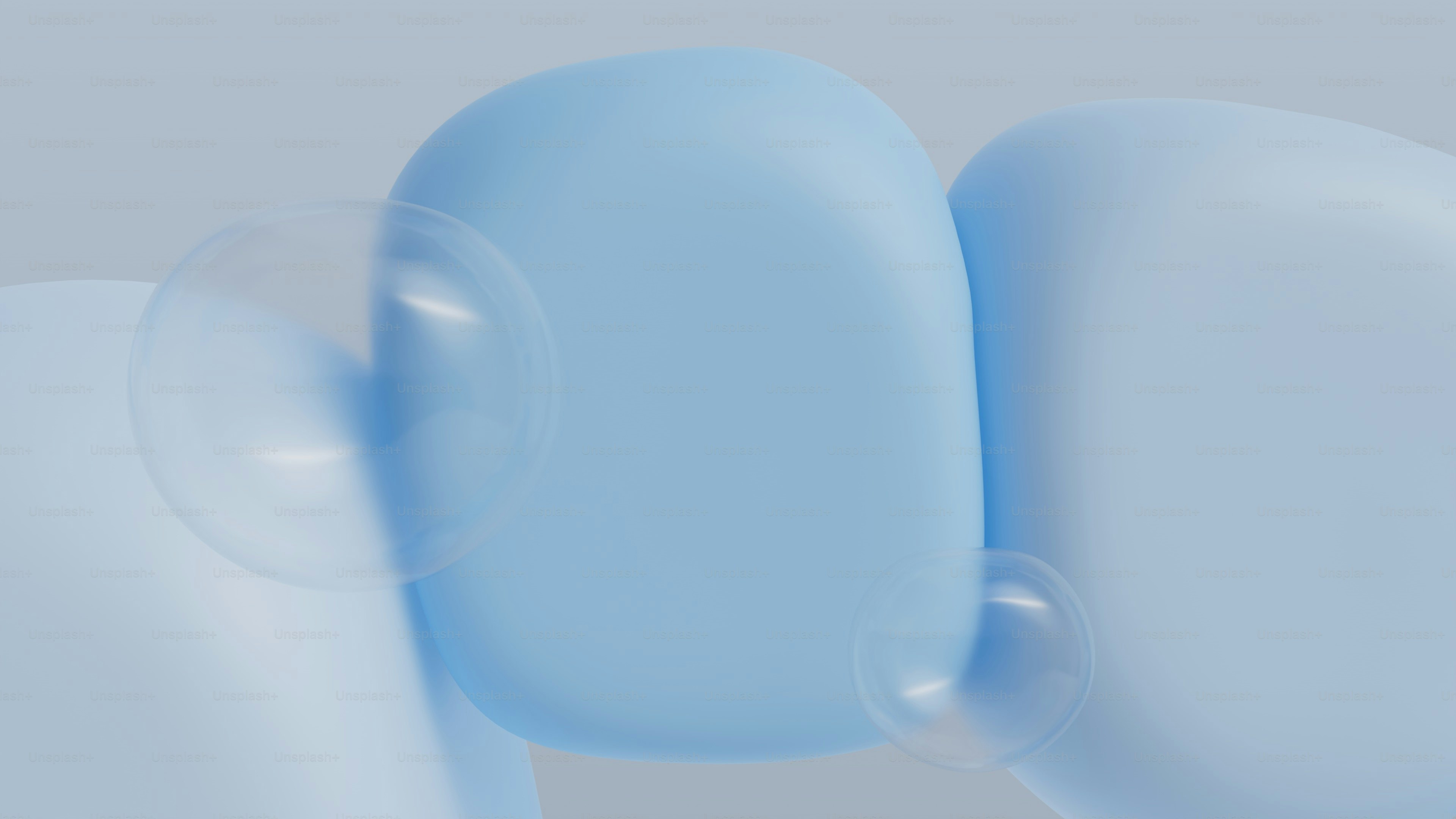 Drei glatte, abgerundete blaue Formen auf einem hellen Hintergrund.