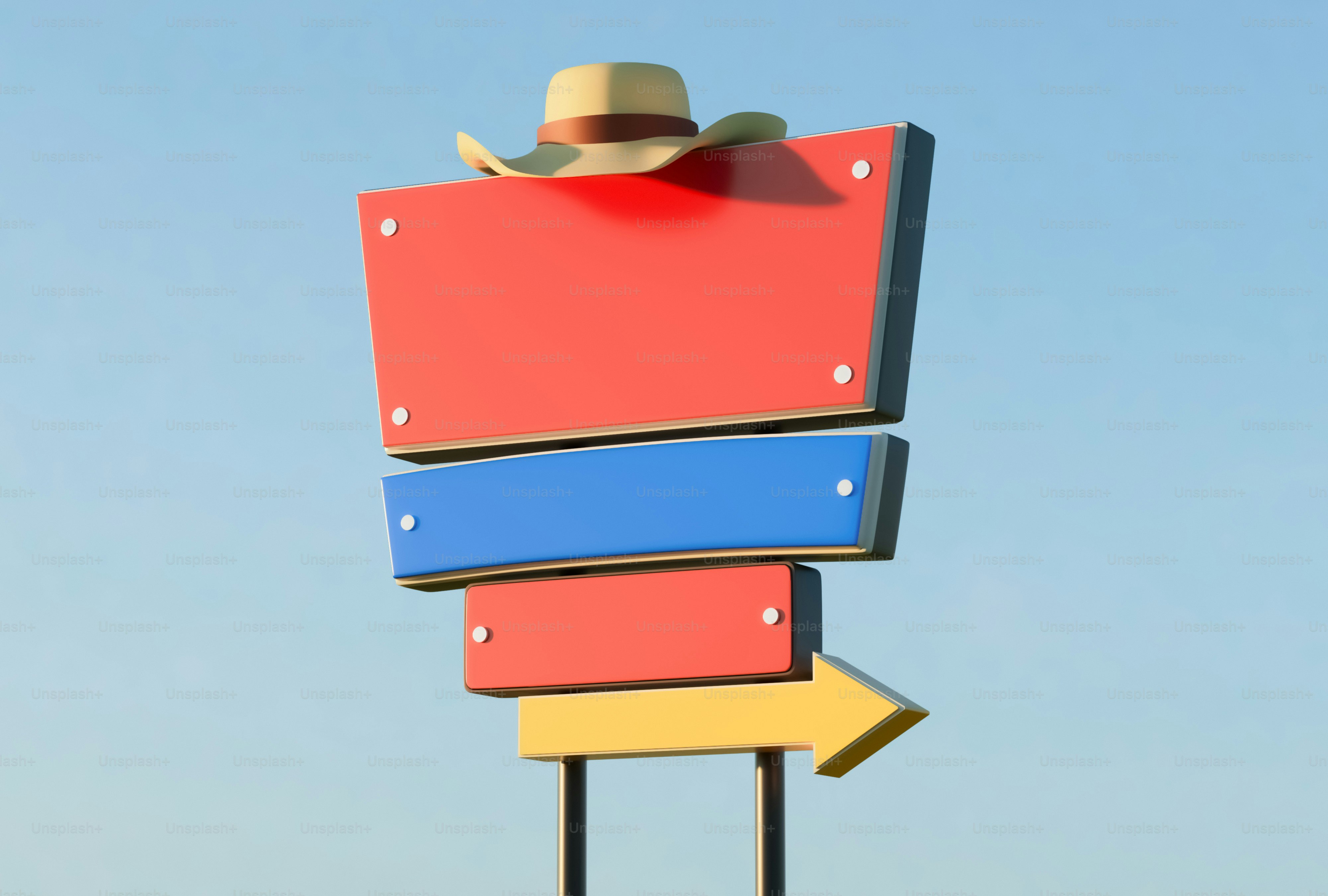 카우보이 모자가 다채로운 방향 표지판 위에 놓여 있다.