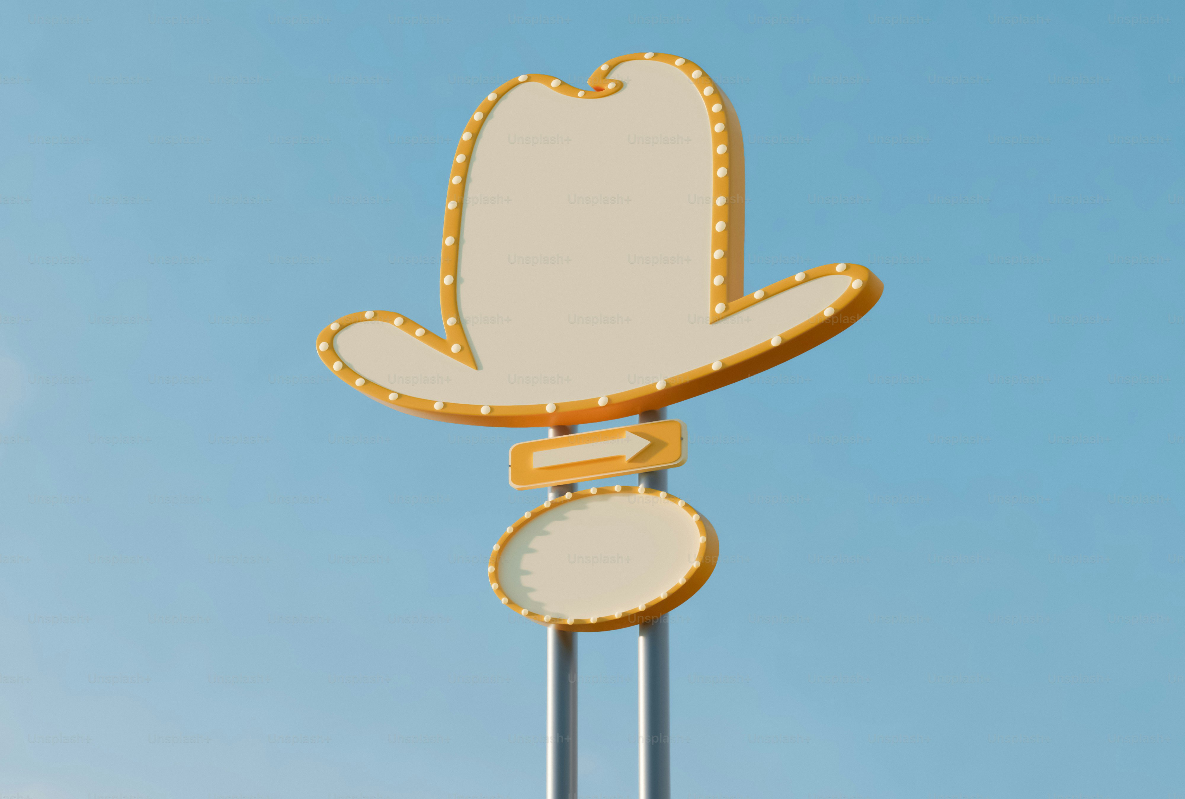 푸른 하늘을 배경으로 한 카우보이 모자 모양의 네온사인