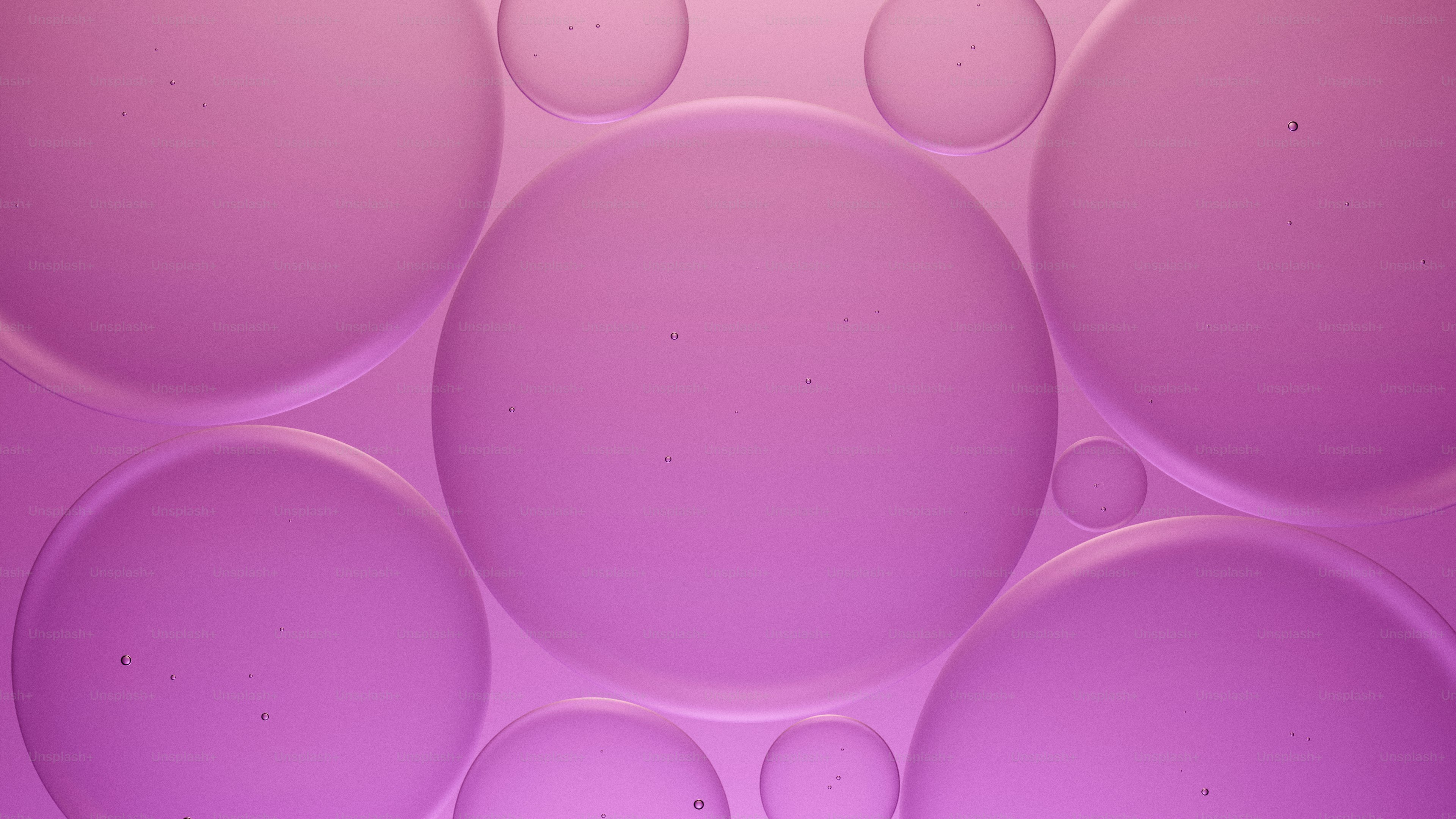 Close-up of pink bubbles on a pink background