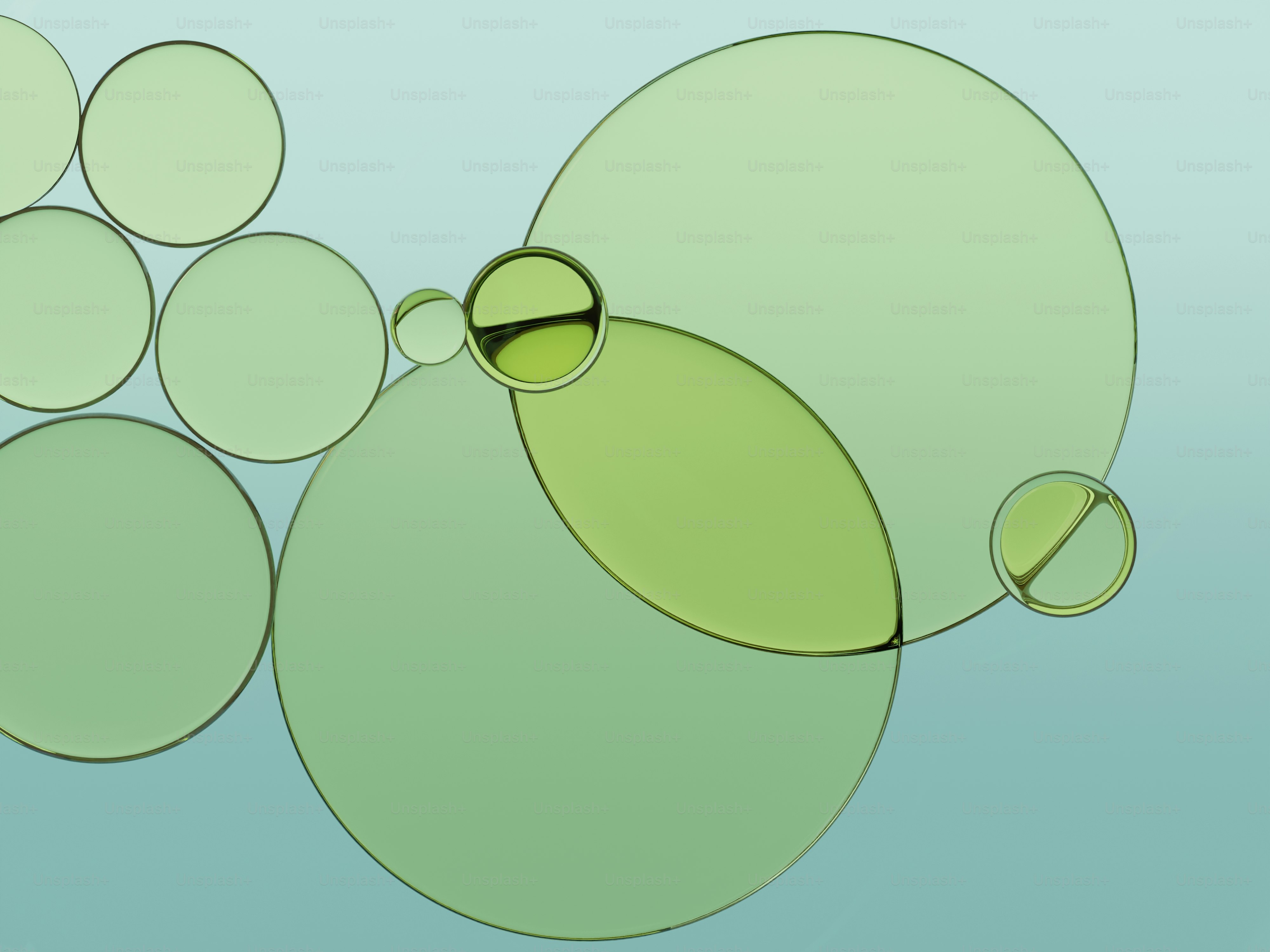 薄い青の背景に緑の円と楕円