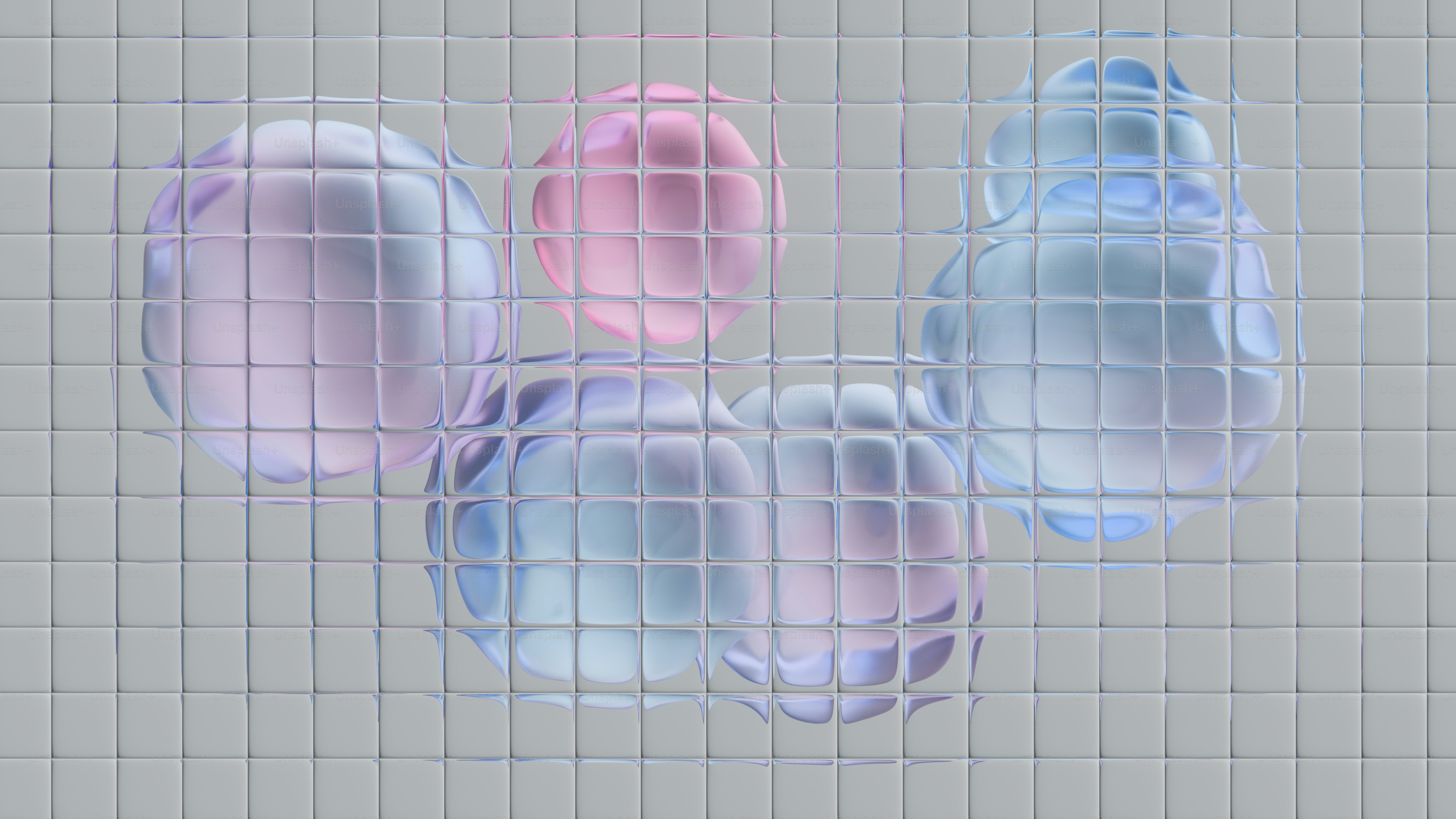 격자 배경에 파스텔 색상의 반투명 구체들.