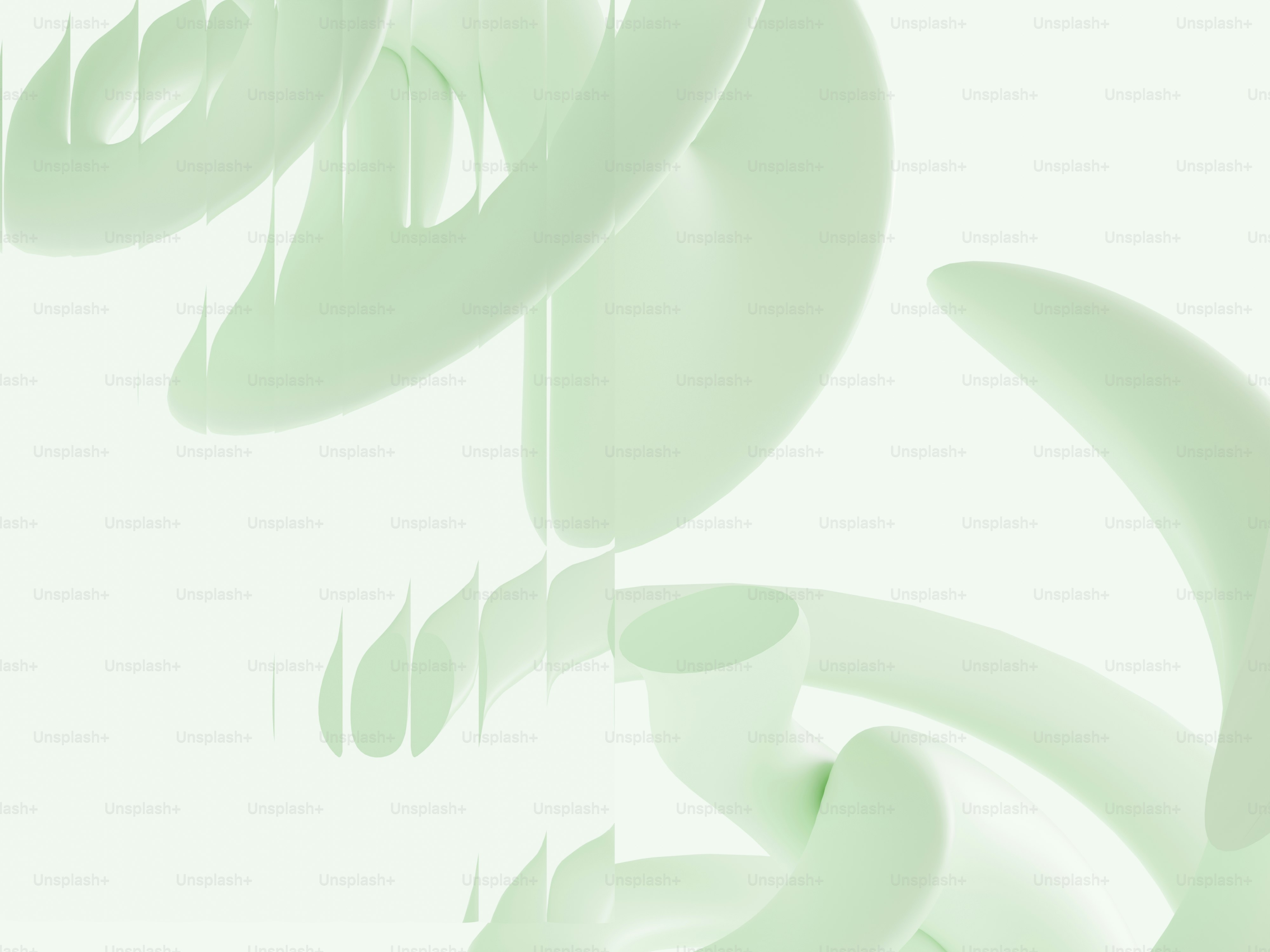 白い背景に抽象的なパステルグリーンの形が描かれています