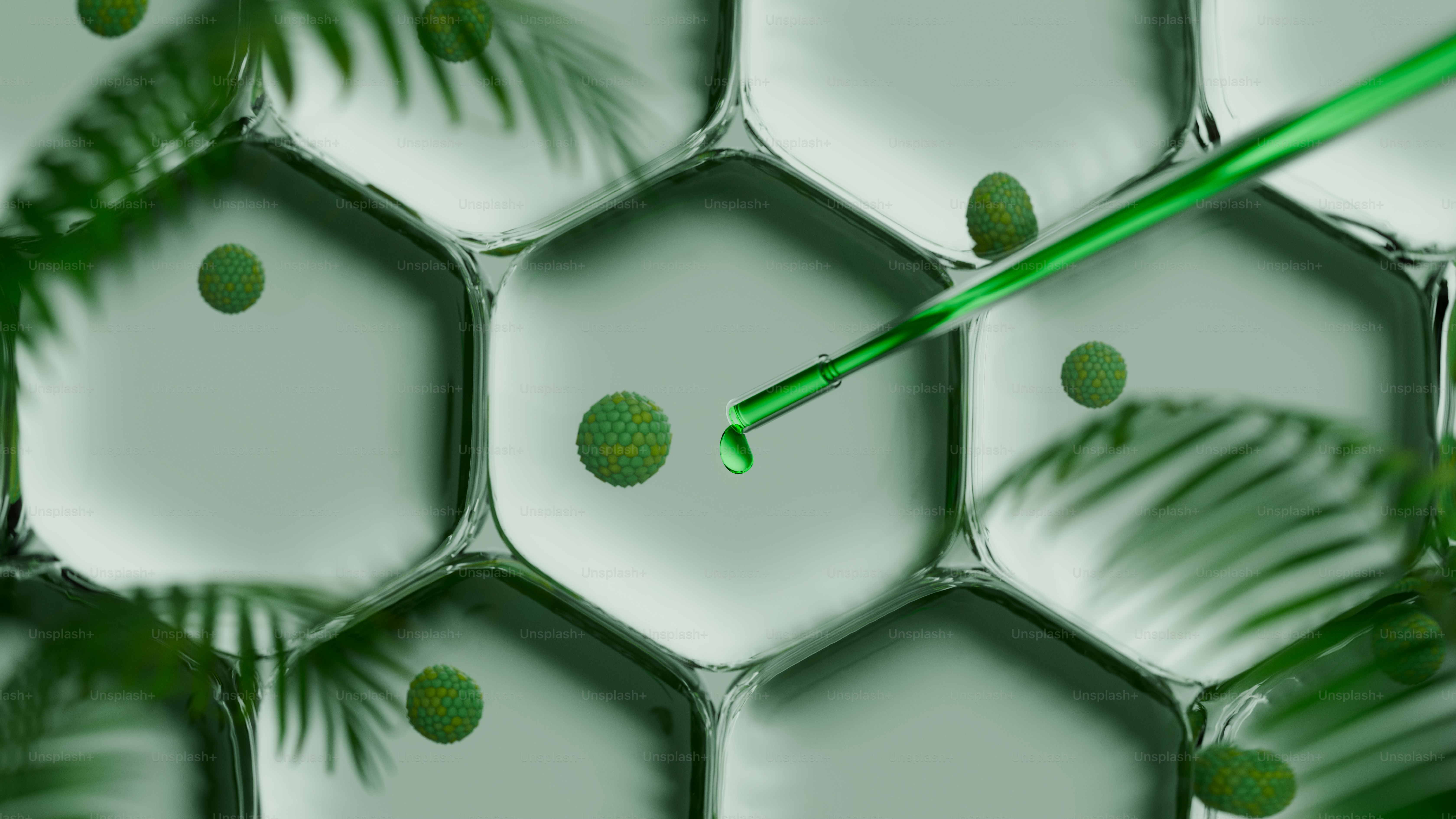 El líquido verde gotea de la pipeta sobre las células de las plantas.