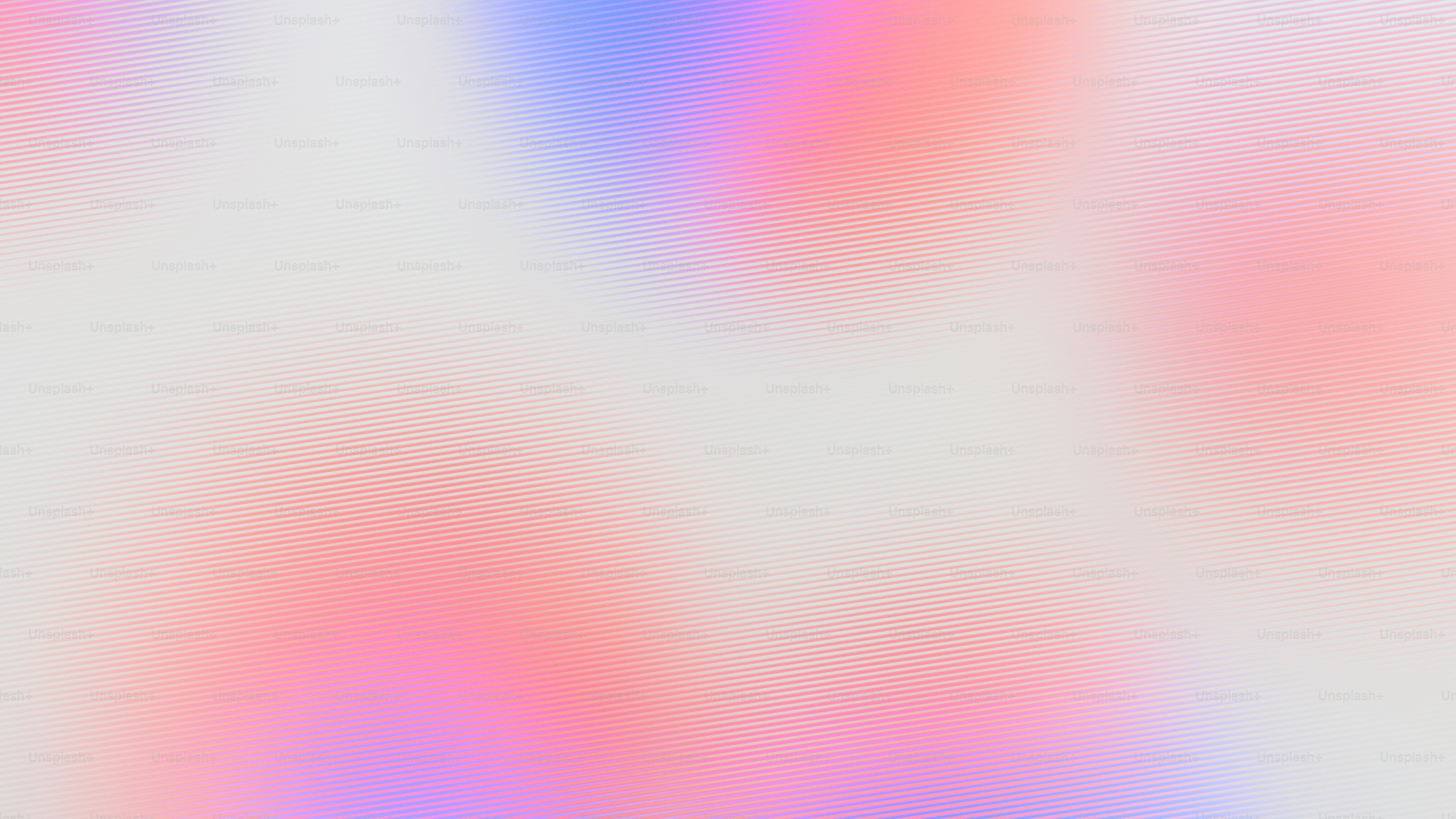 Suaves colores pastel se mezclan sobre un fondo claro