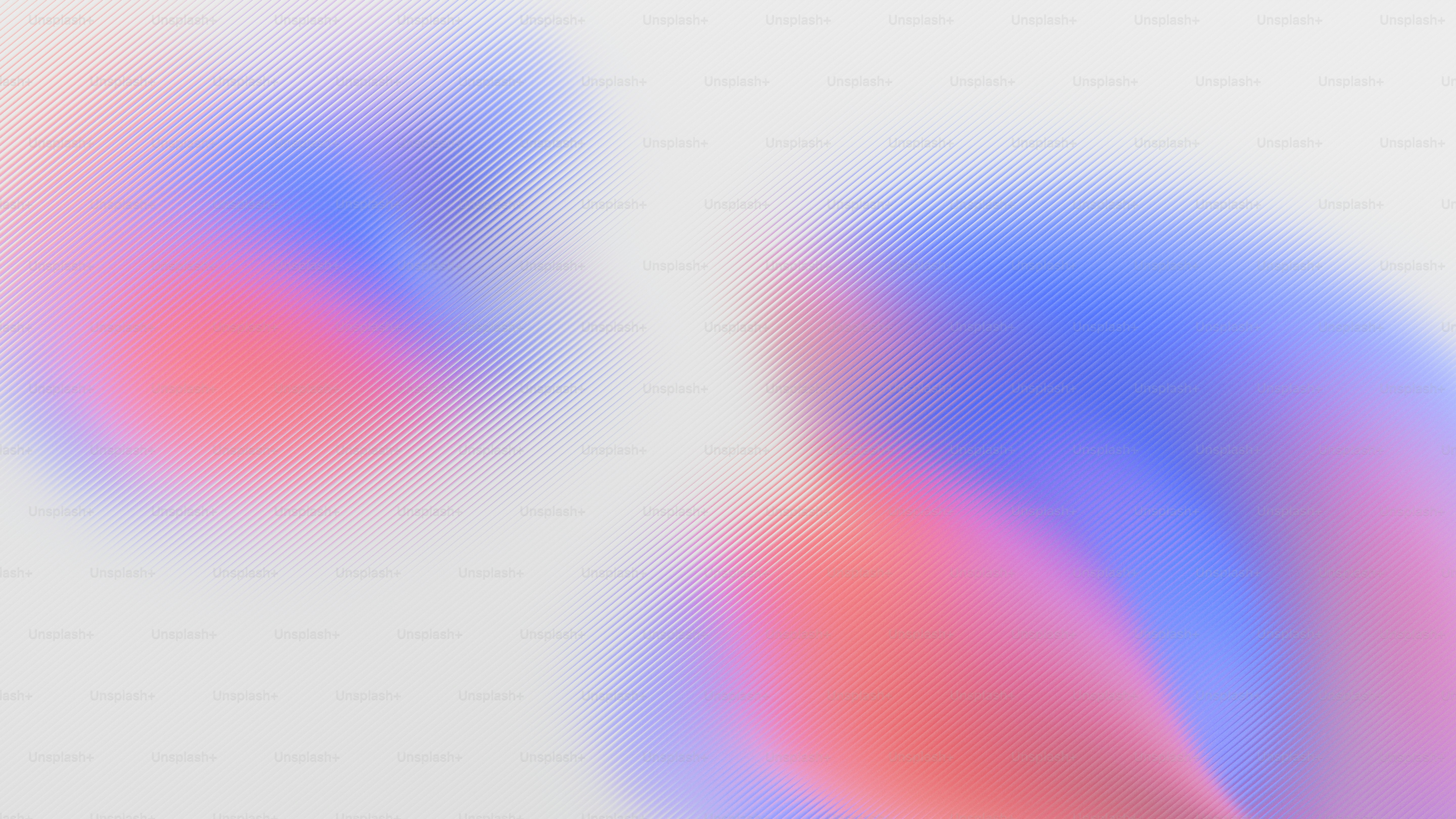 Los colores abstractos en pastel se mezclan suavemente sobre un fondo blanco.