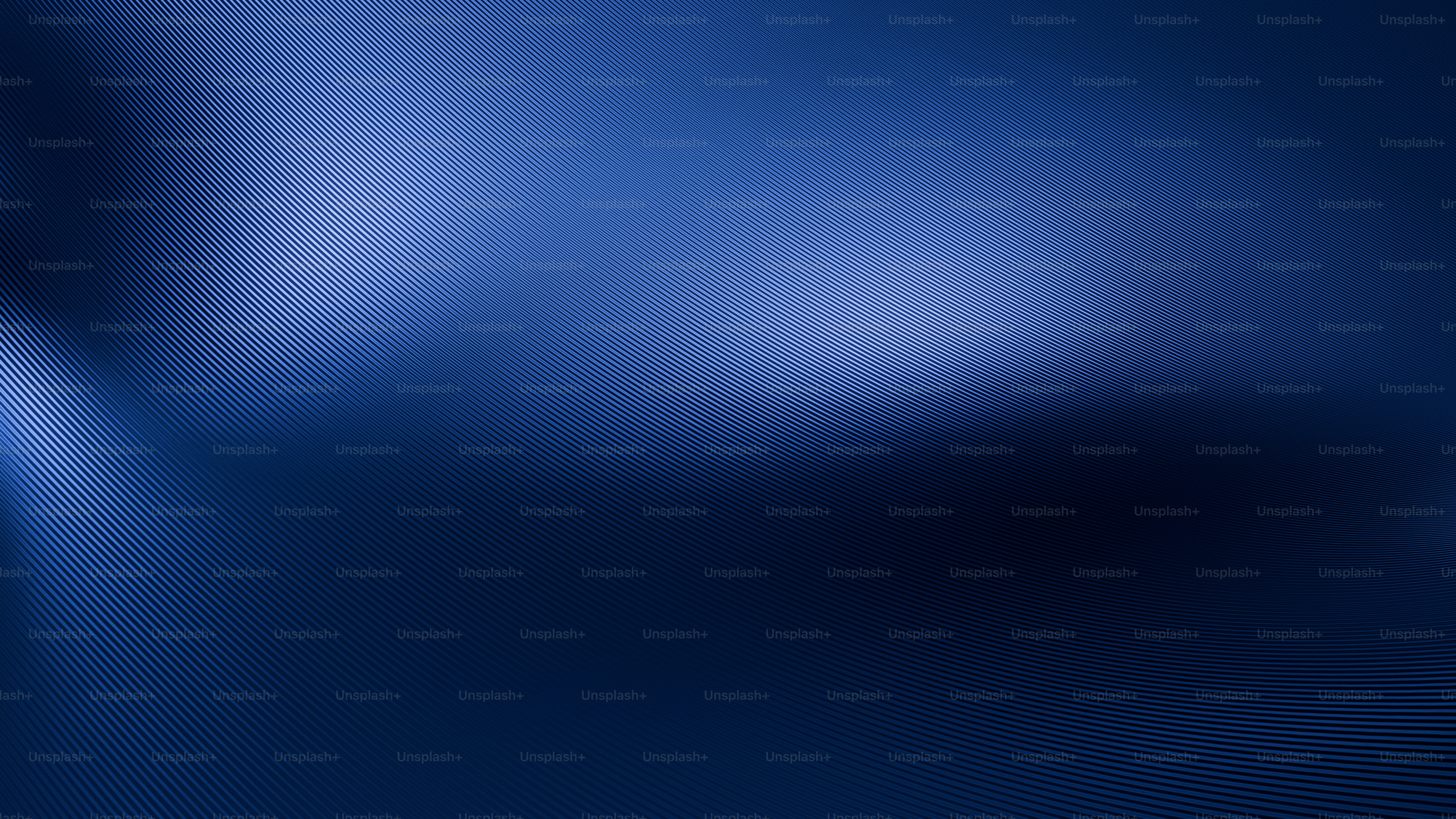 Abstract dark blue background with soft light highlights