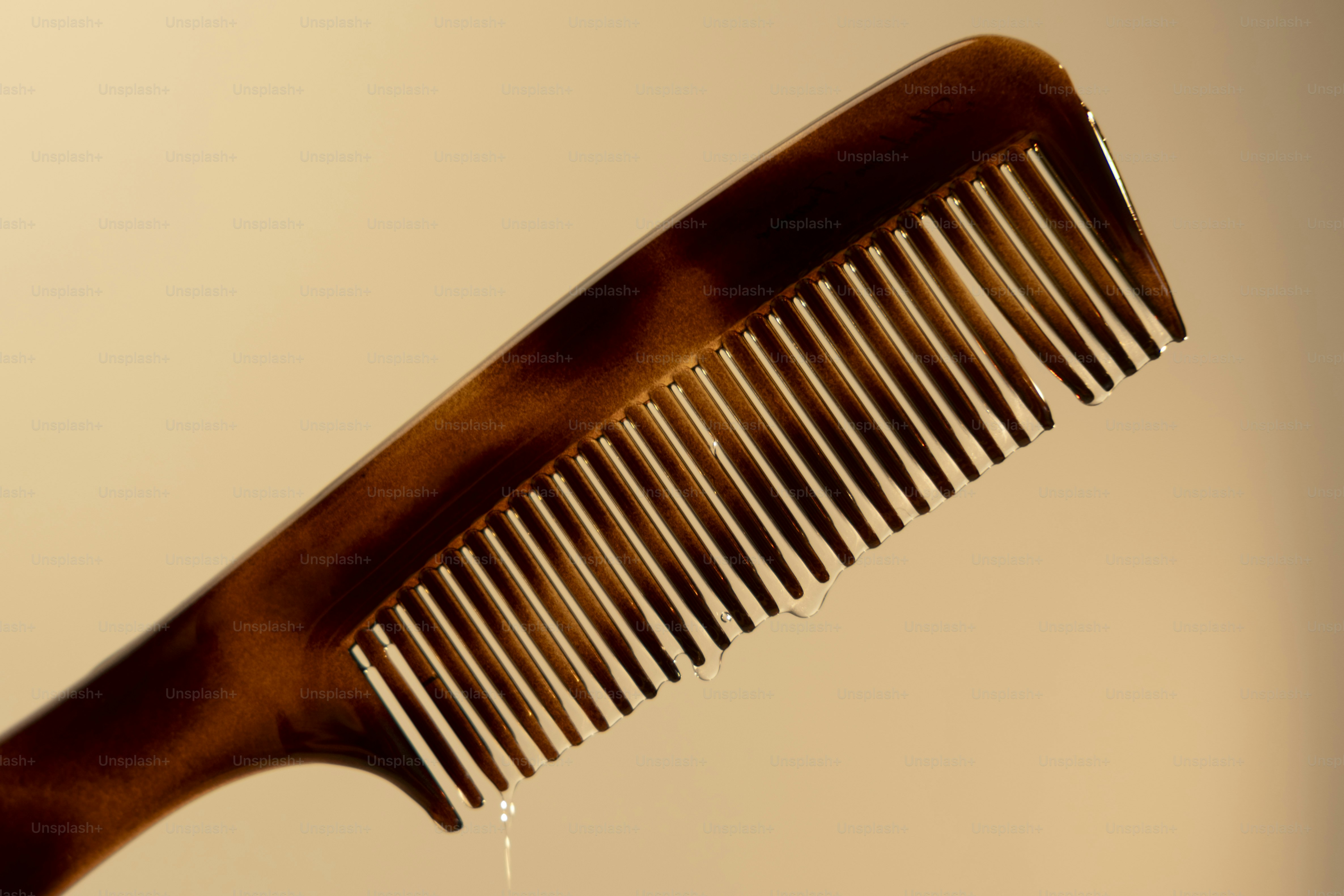 A tortoiseshell comb with a plain background photo – Beauty salon Image ...