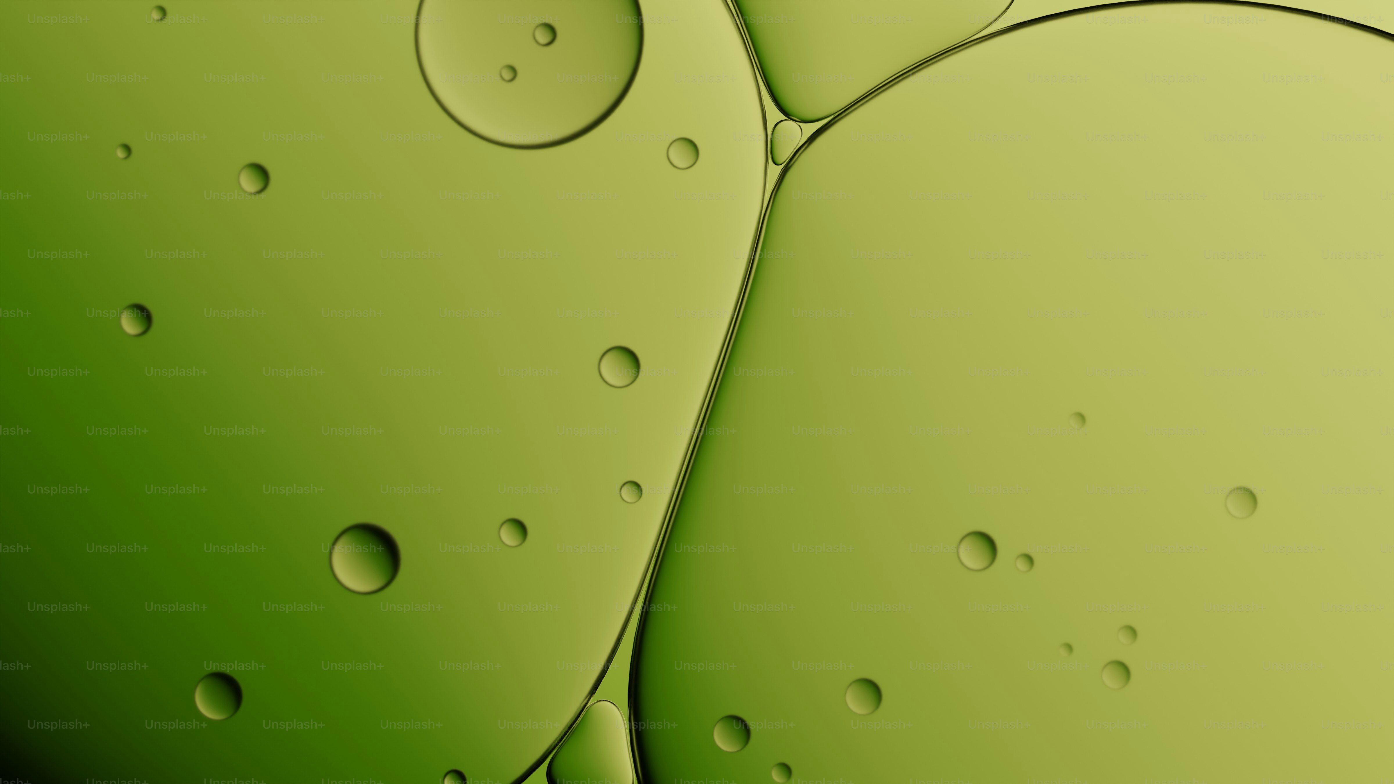 Abstrakte grüne Kugeln mit kleinen Blasen.