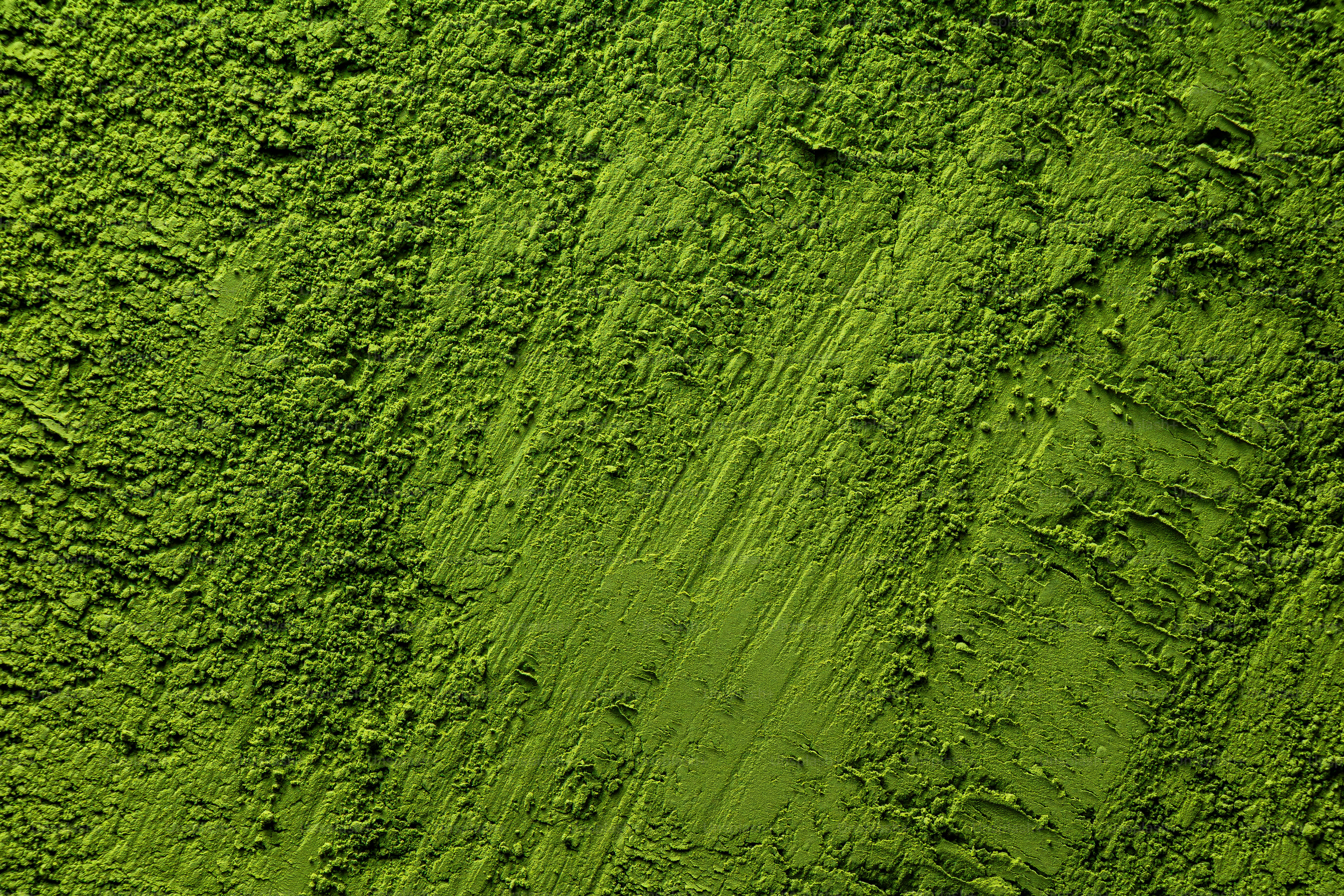 テクスチャーのある緑色の表面のクローズアップ