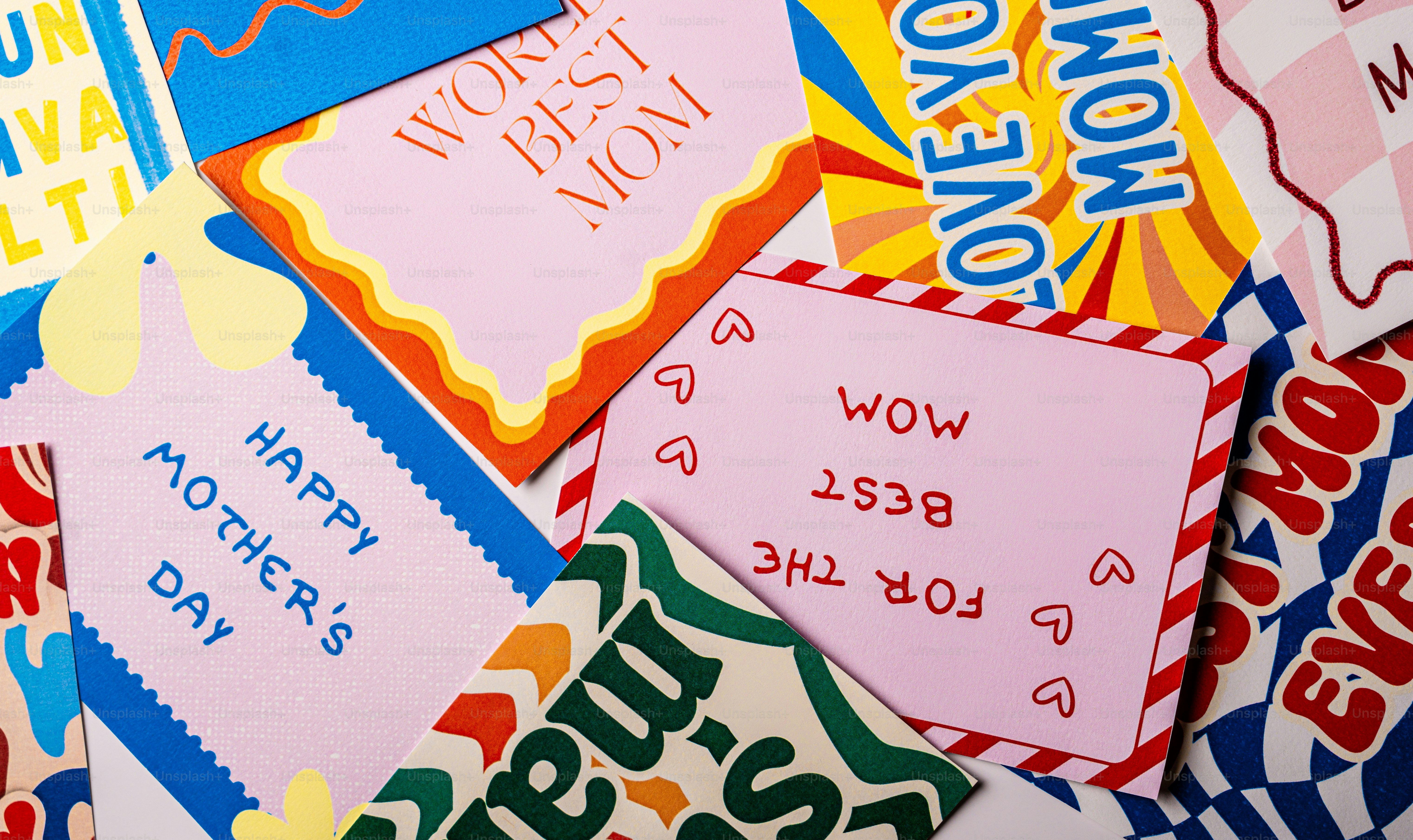 Various mother's day cards with colorful designs.