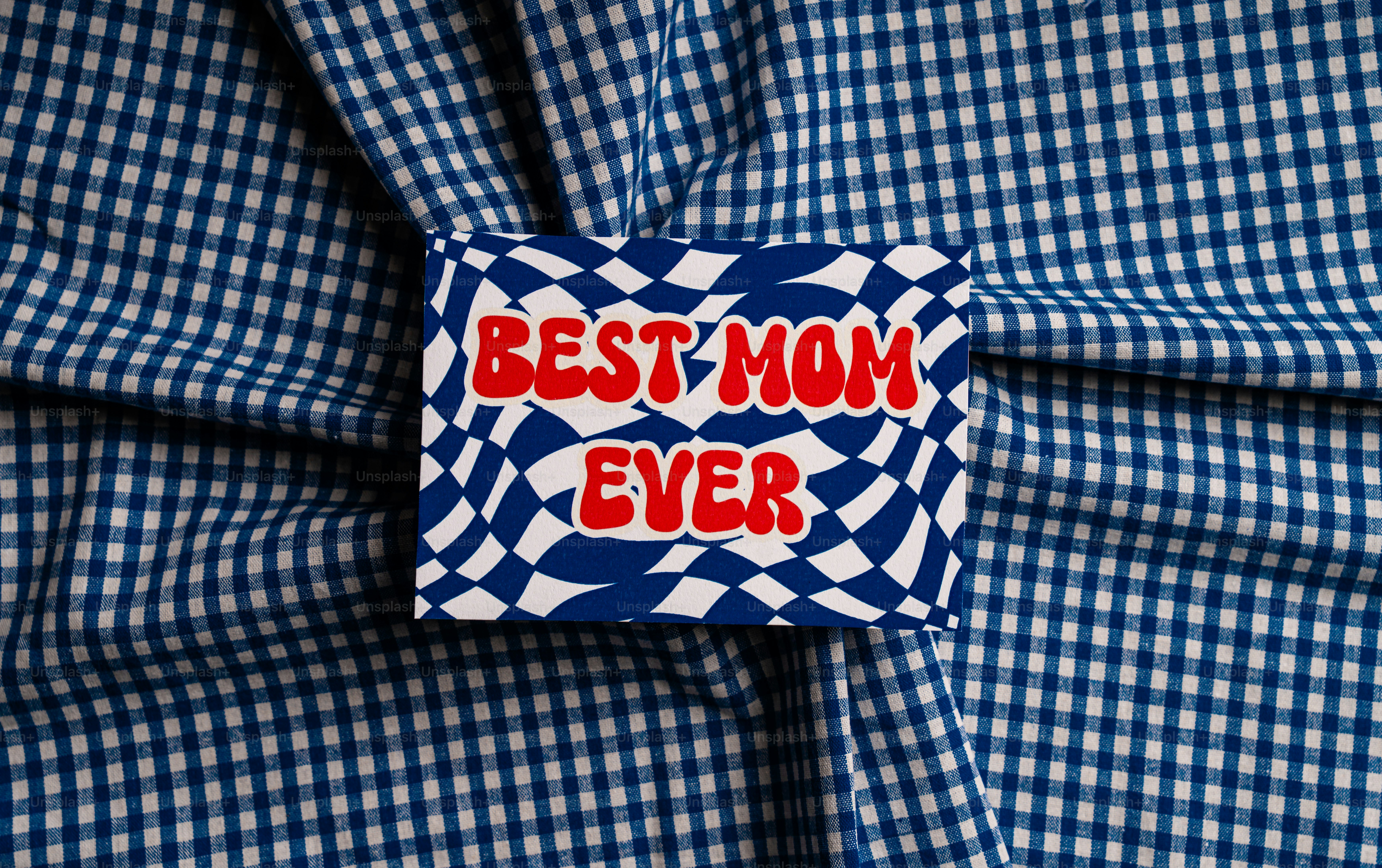 Best mom ever sign on blue checkered fabric