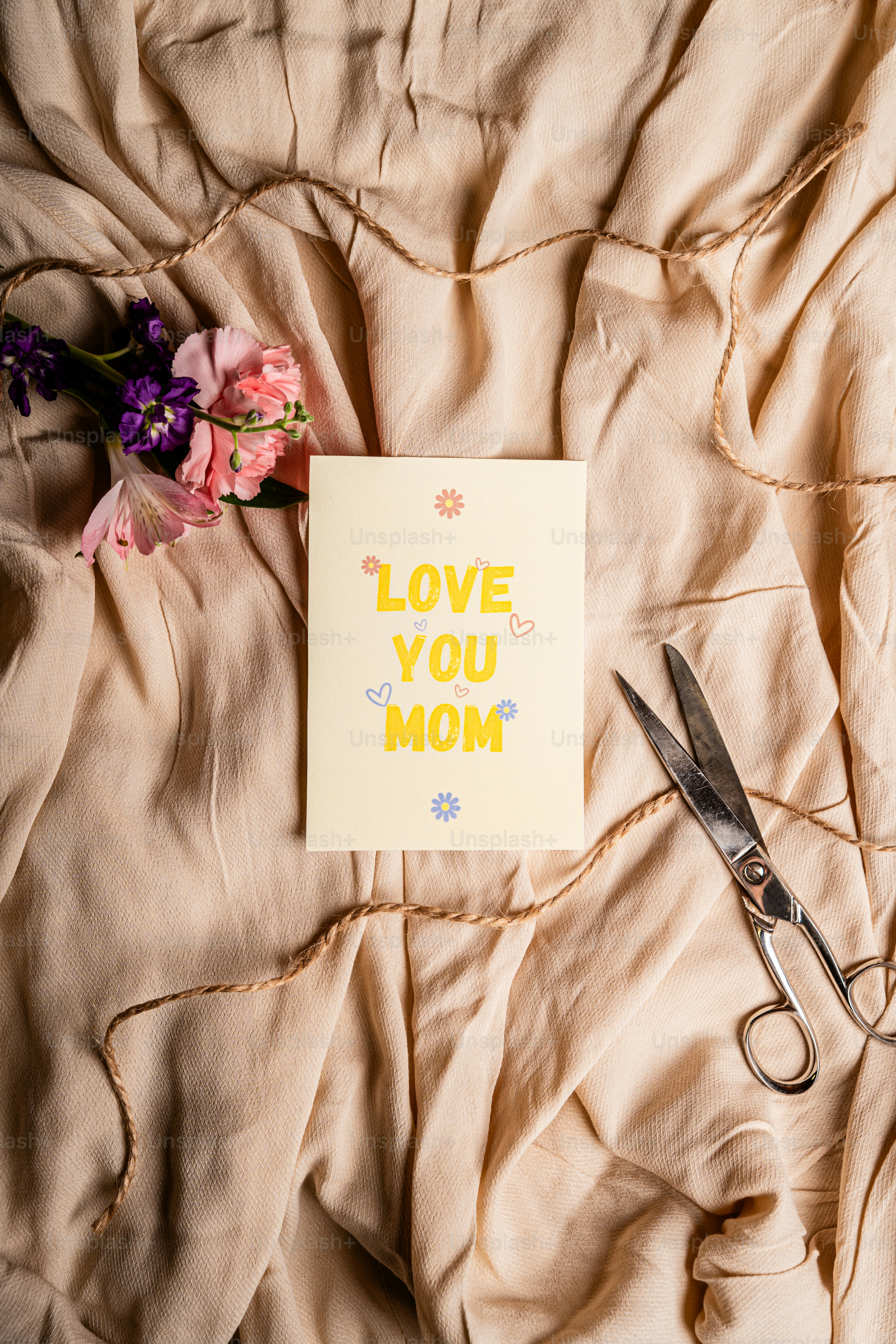Love you mom card with flowers and scissors