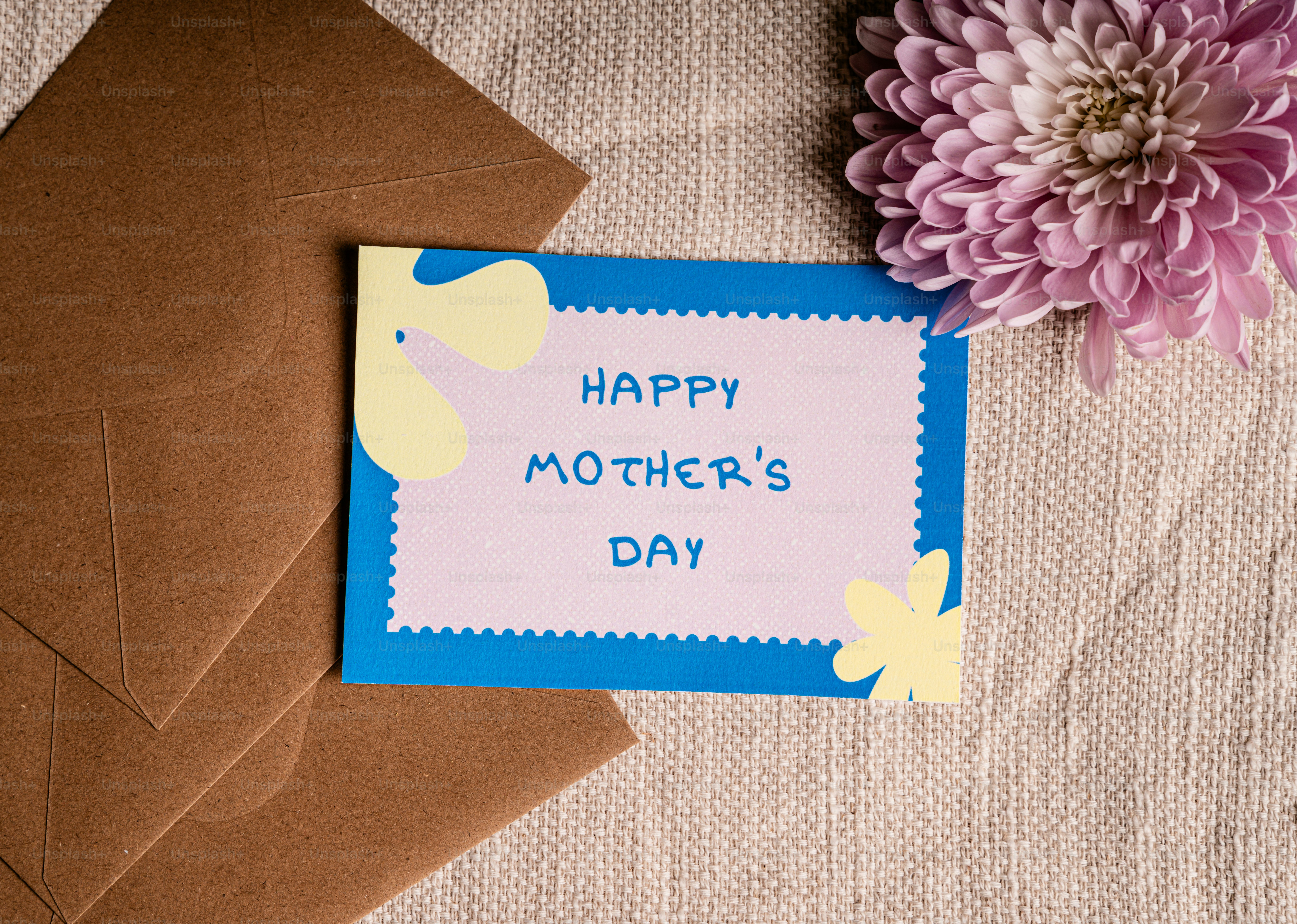 Happy mother's day card with flower and envelopes