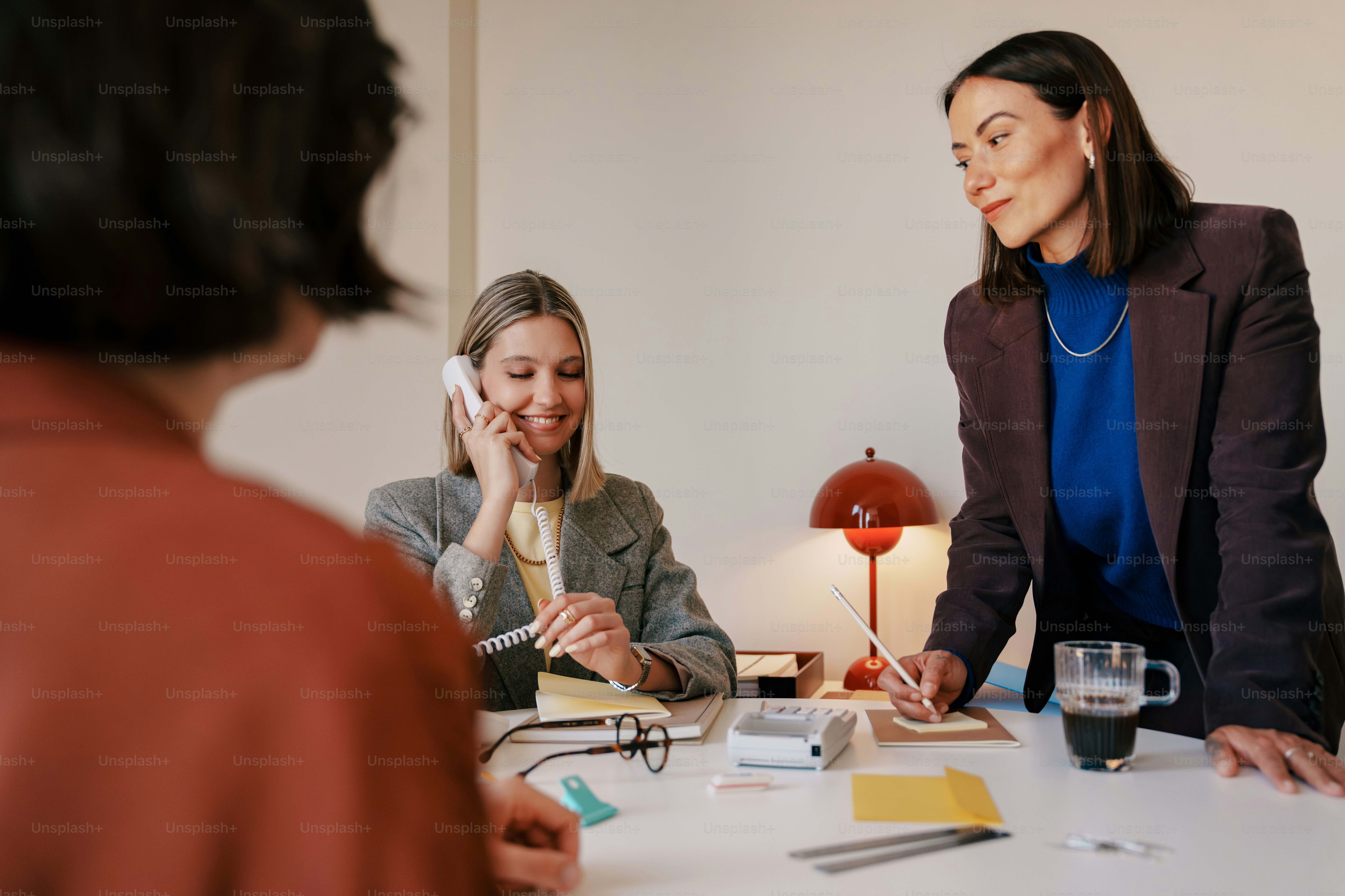Three women in a business meeting around a table. photo – Office Image ...