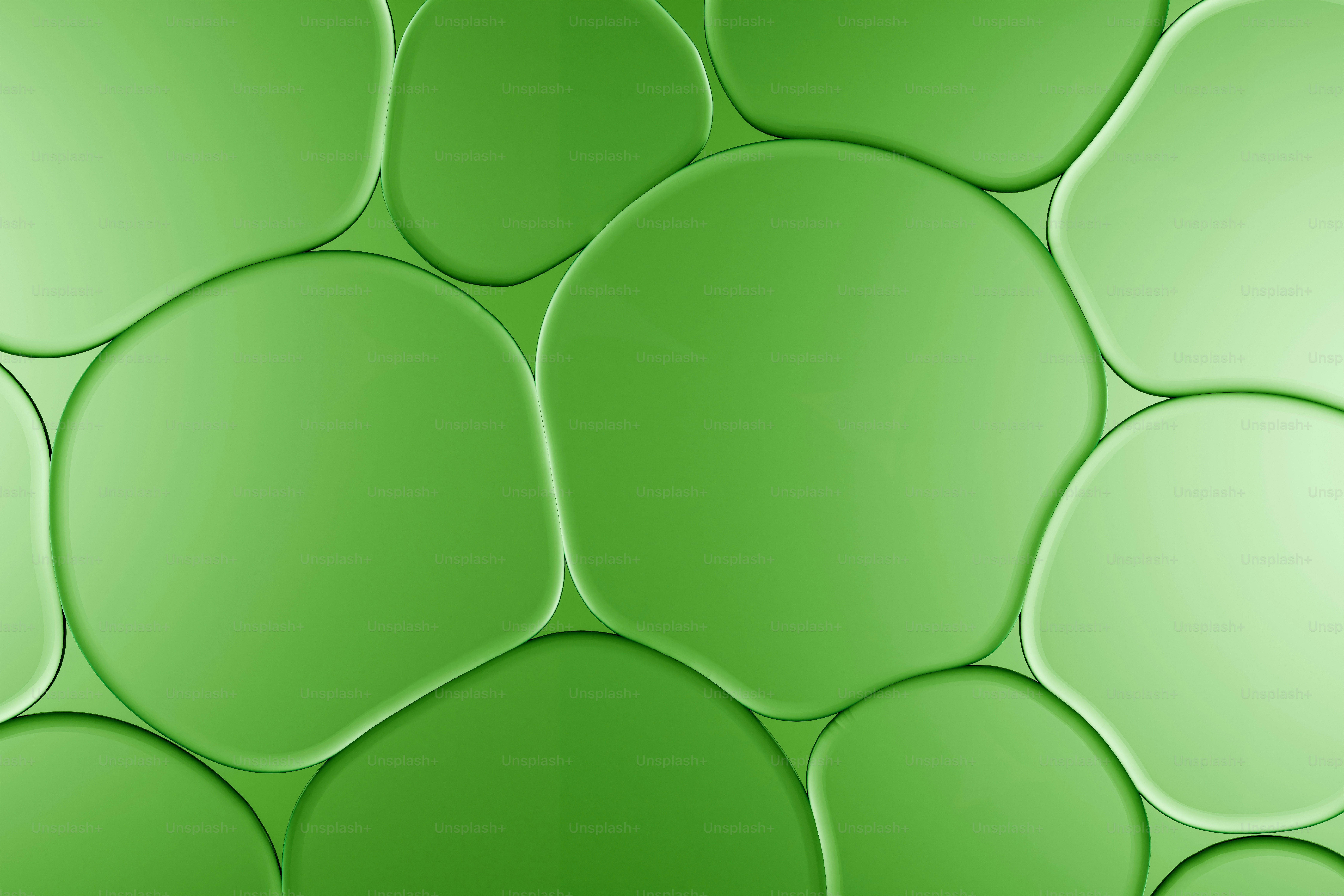 A pattern of smooth, rounded green shapes. photo – Background Image on ...