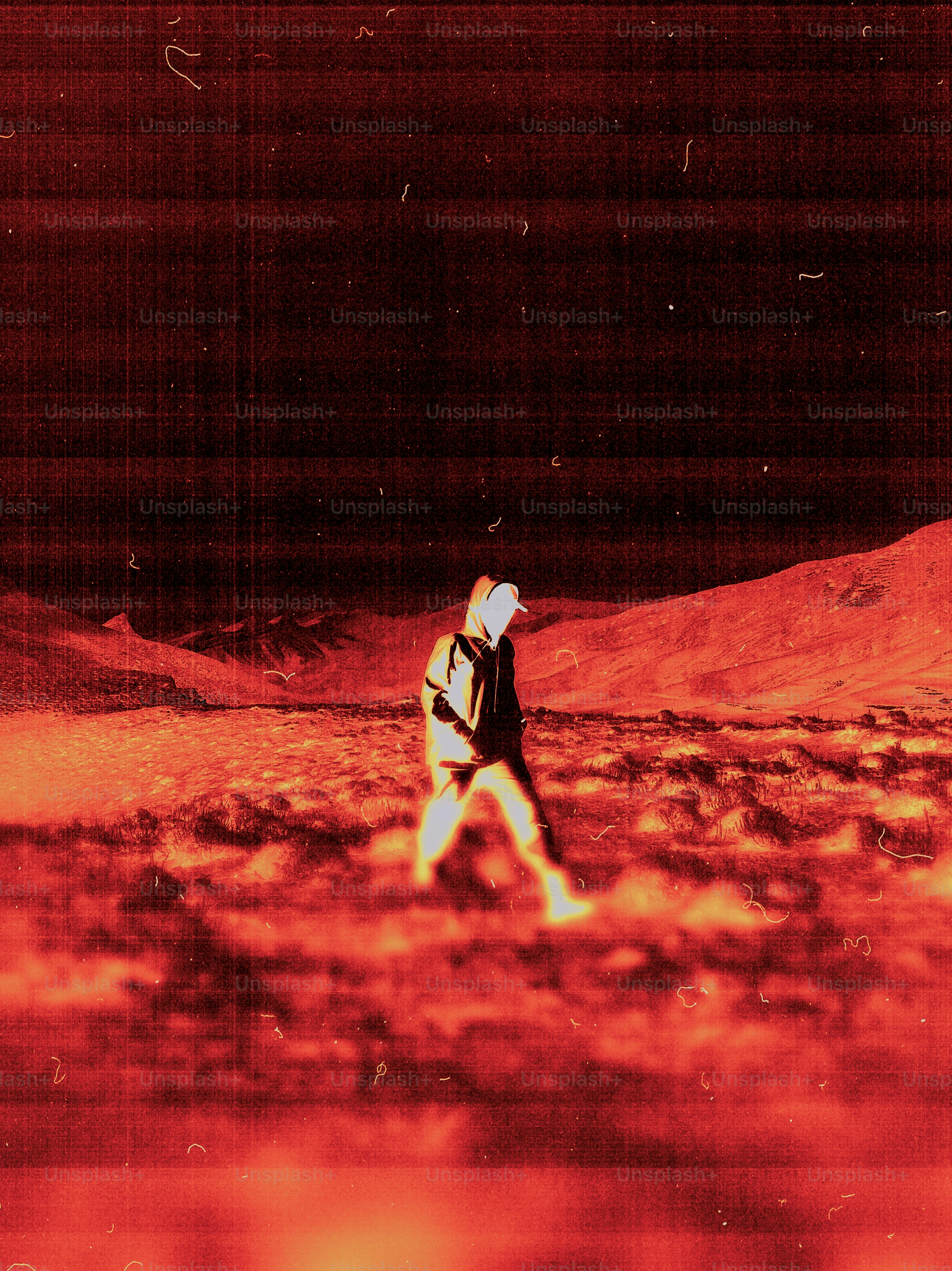 A person walking in a surreal, fiery landscape.