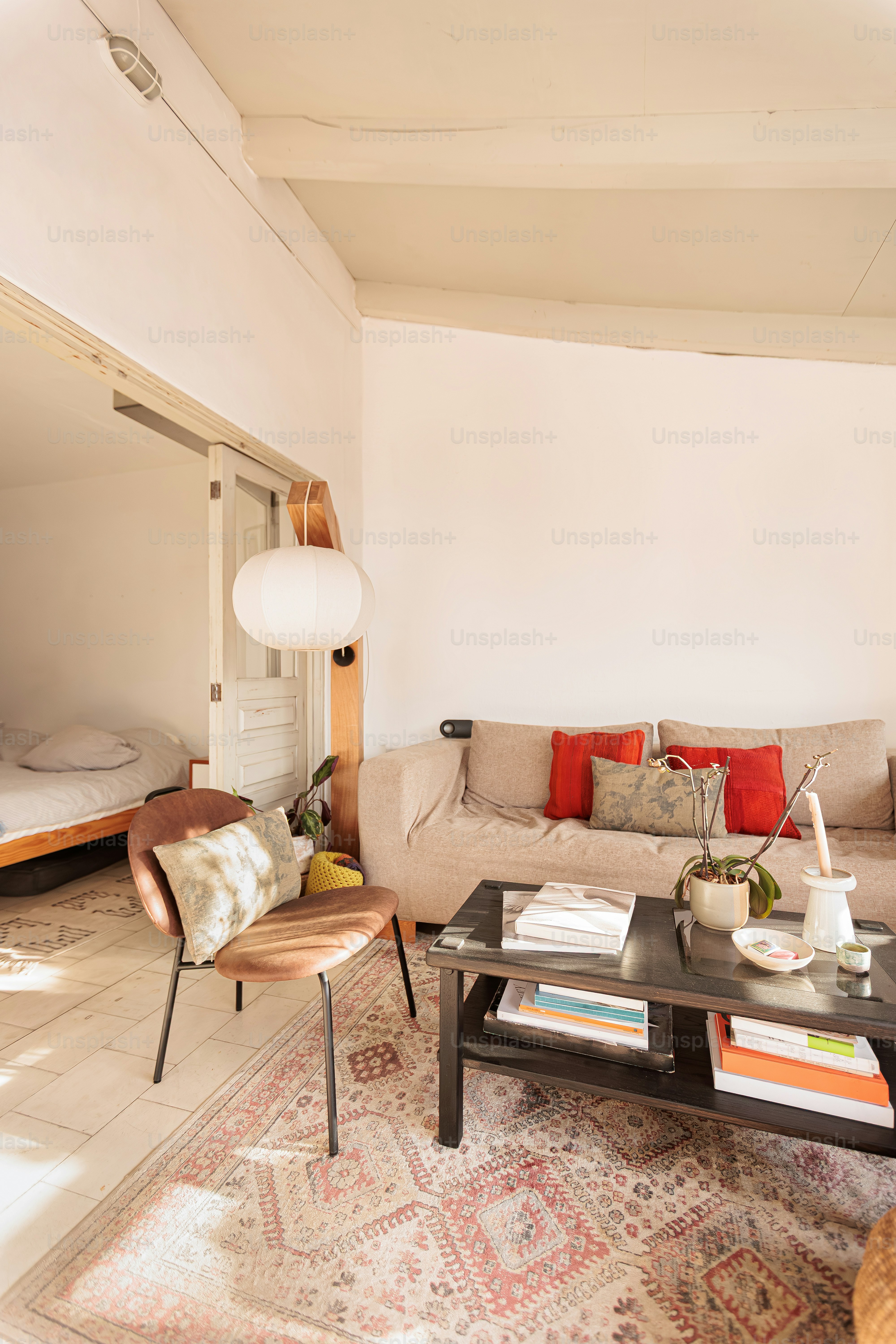 Cozy living room with sofa, chair, and coffee table.