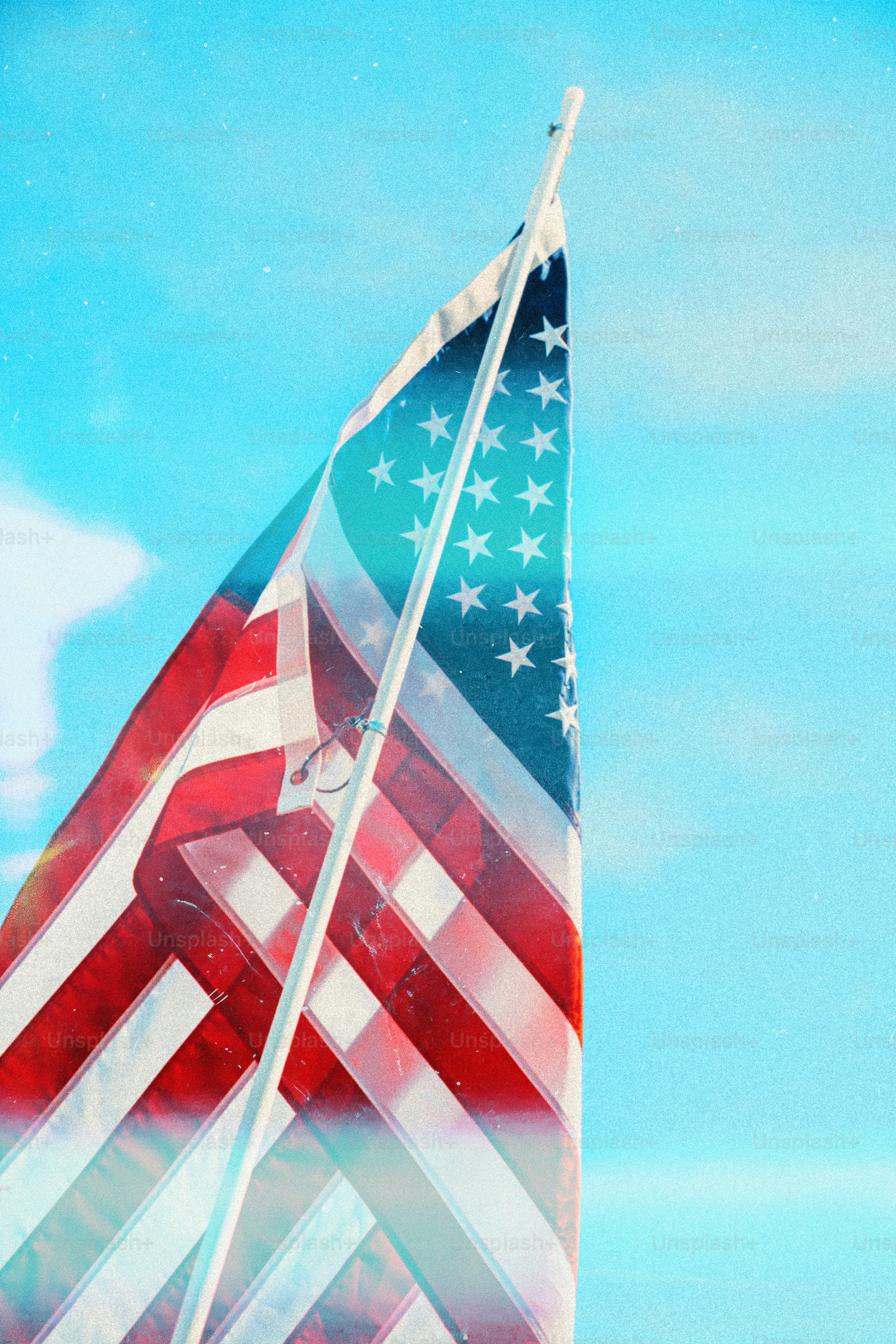 American flag waving against a bright sky photo – Celebration Image on ...