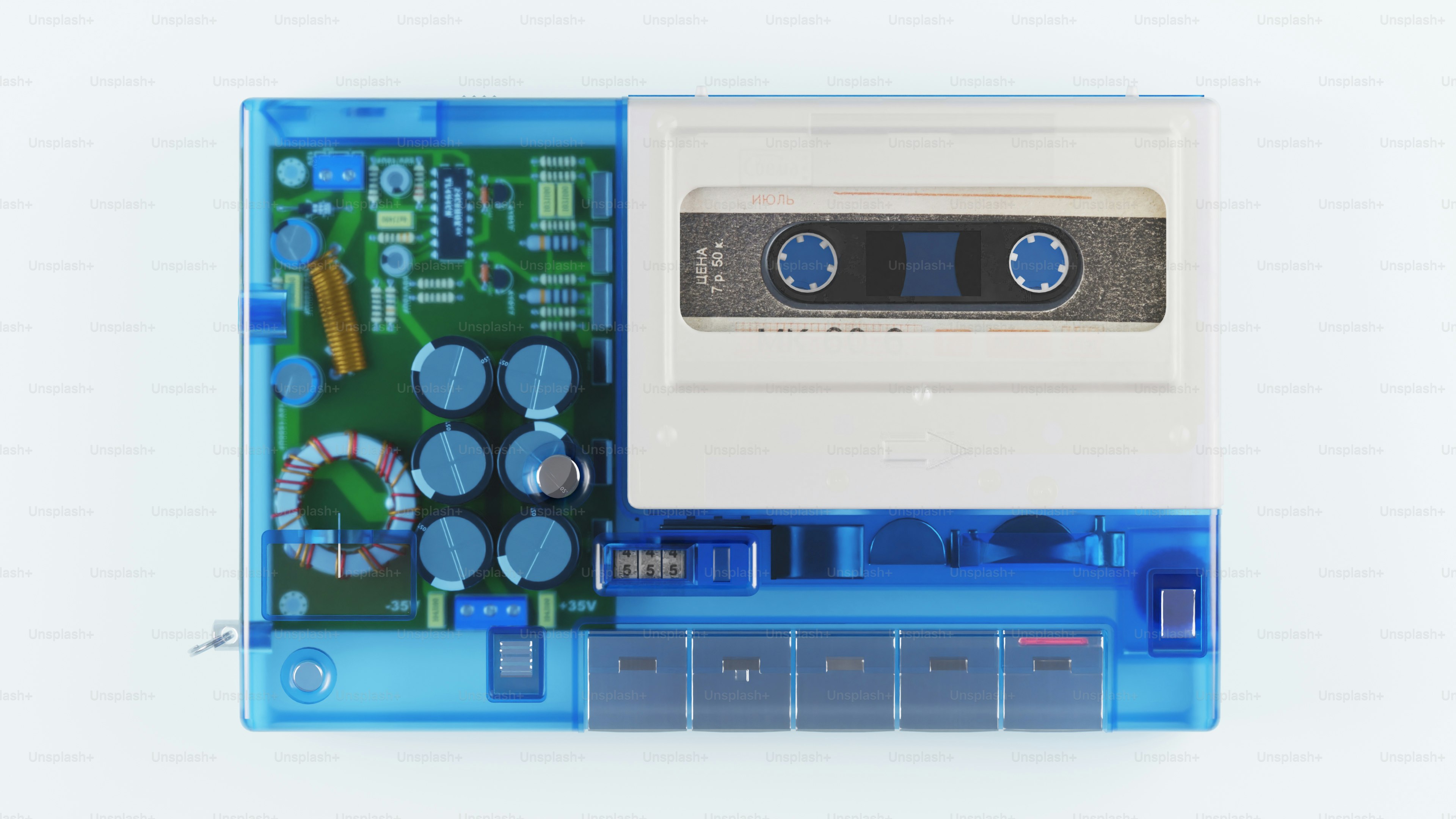 Lecteur de cassettes bleu transparent avec composants internes visibles