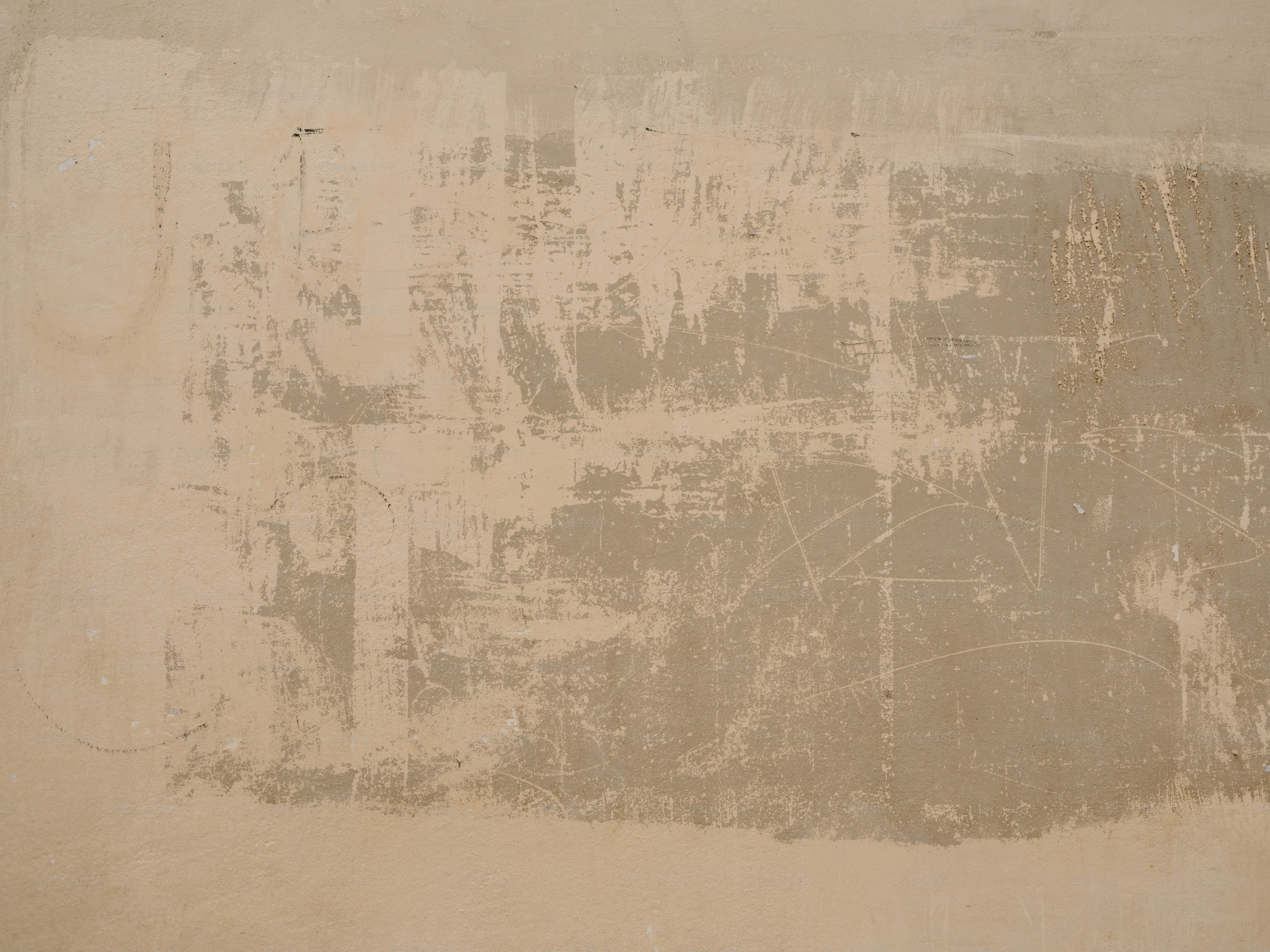 Textured beige wall with scuff marks and scratches photo – Texture ...