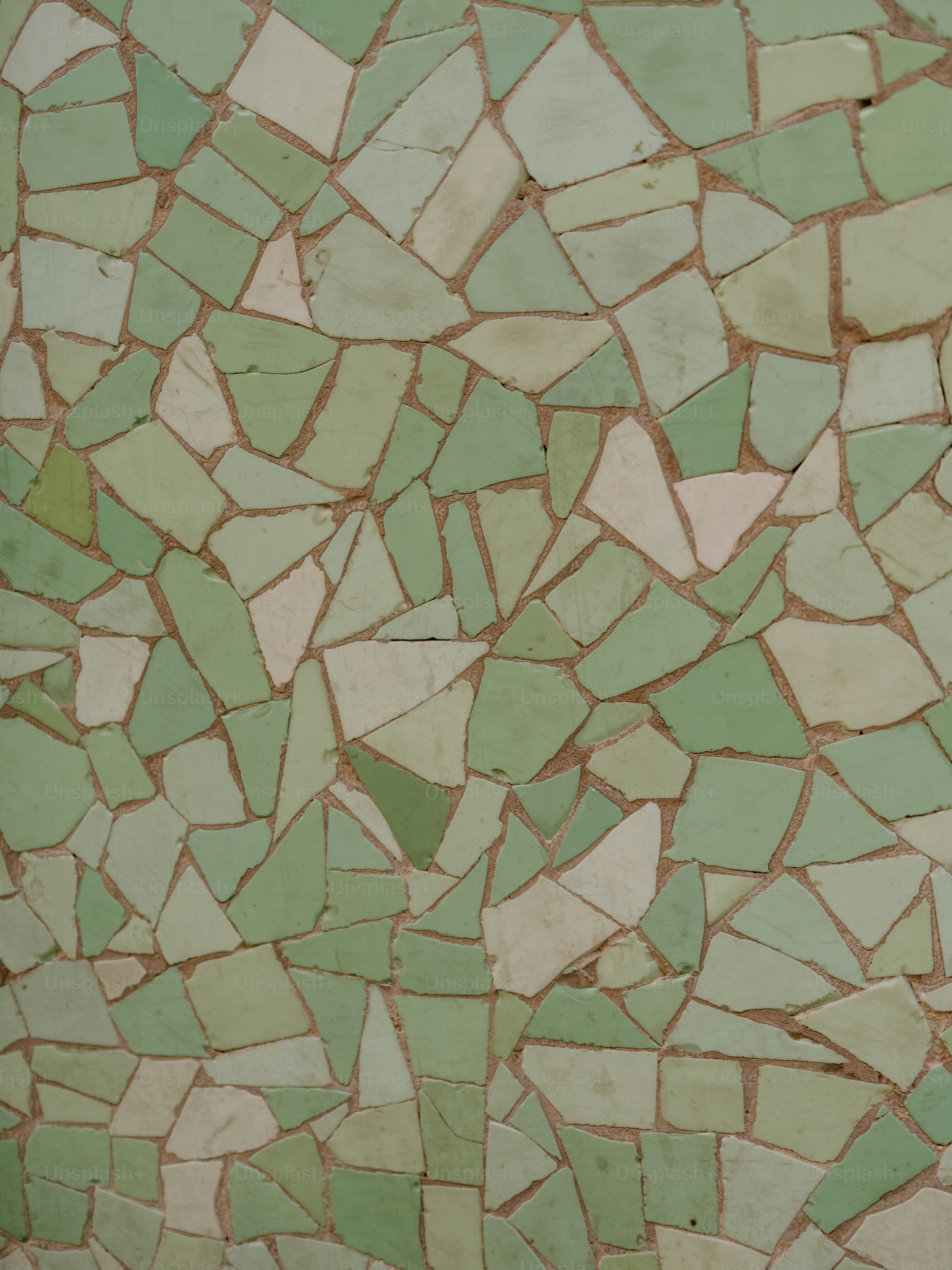 Green and white mosaic tile wall pattern