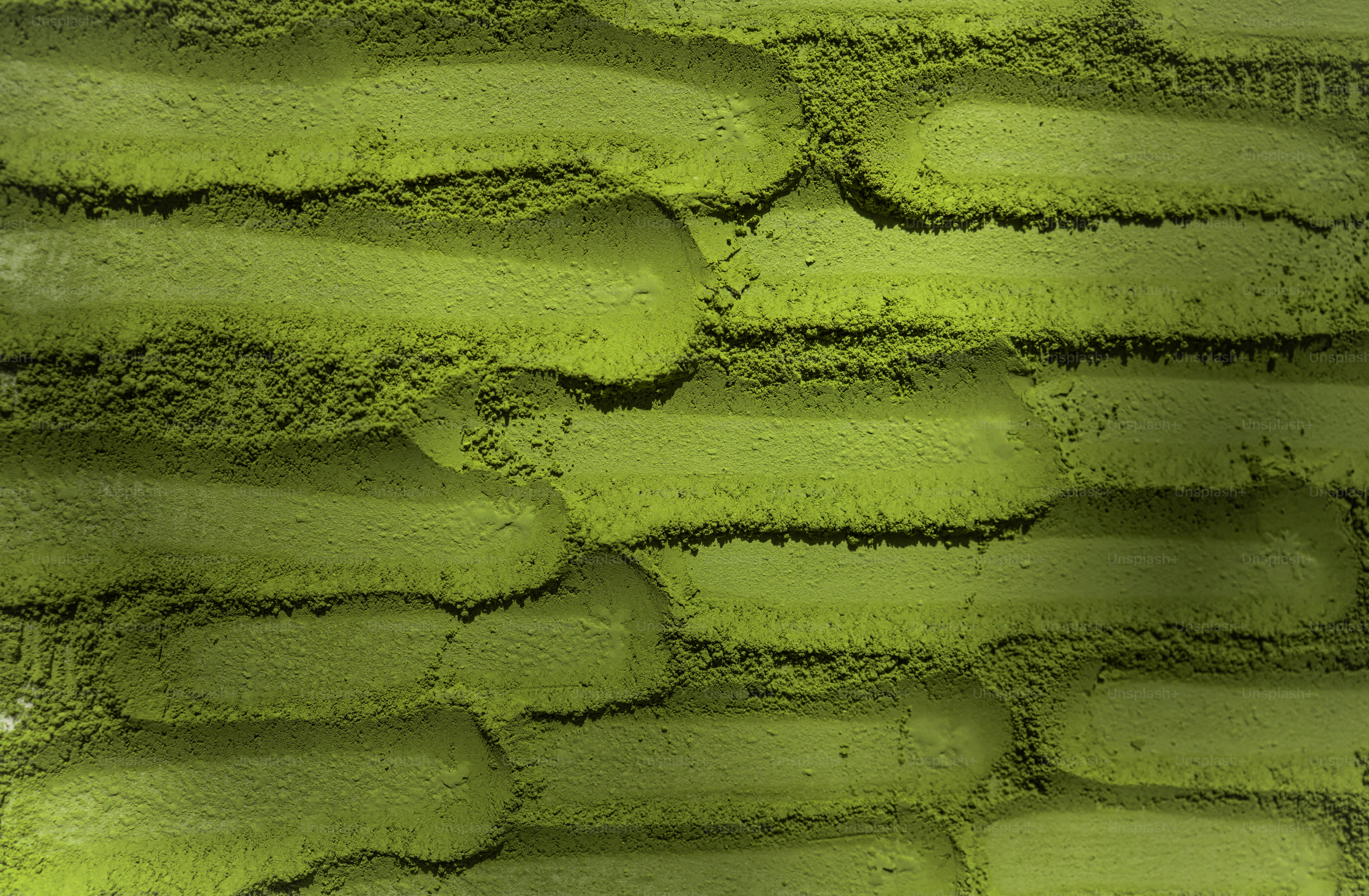 Green textured abstract background with layered shapes