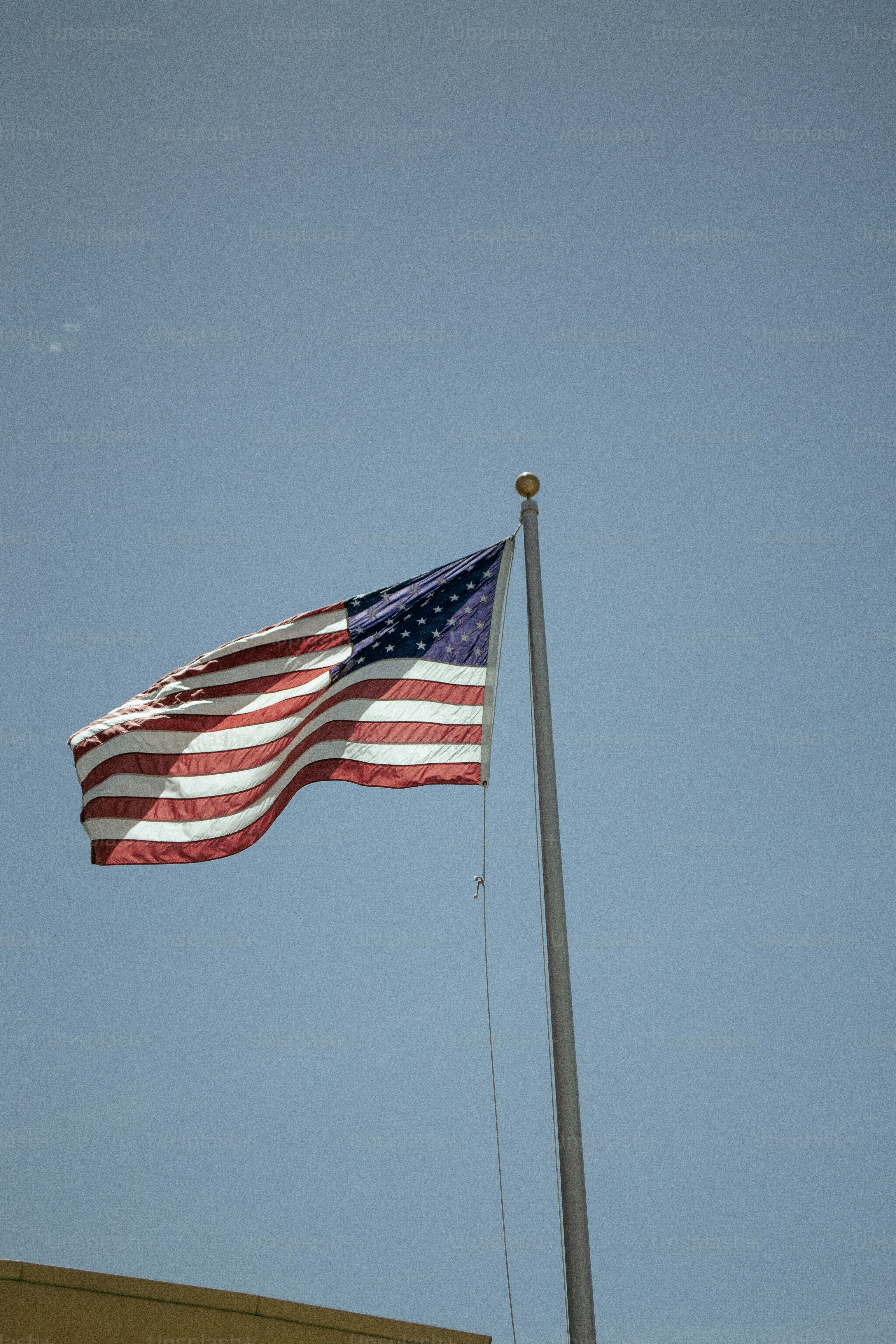 American flag waving against a clear blue sky photo – Usa Image on Unsplash