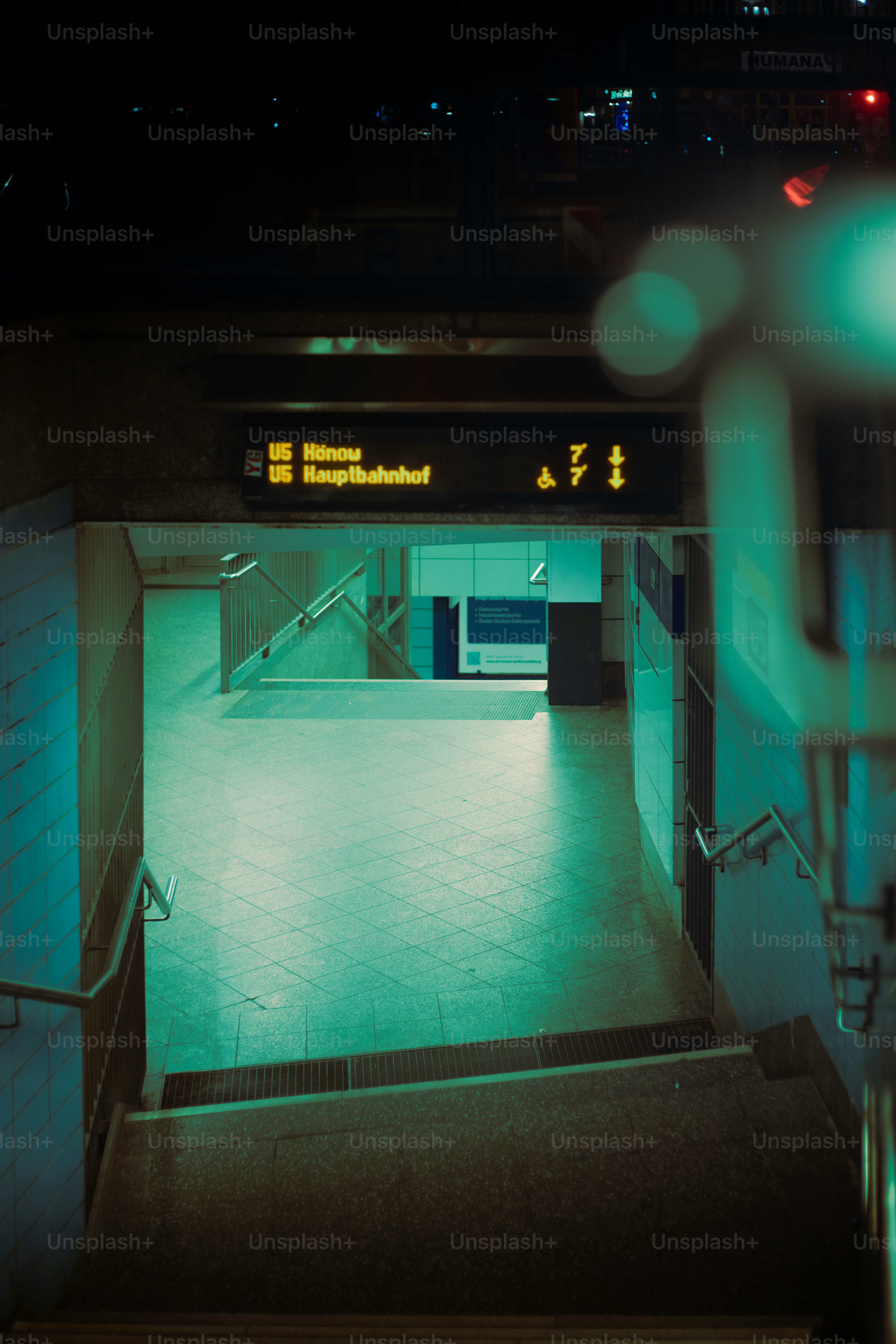 Empty subway station entrance at night