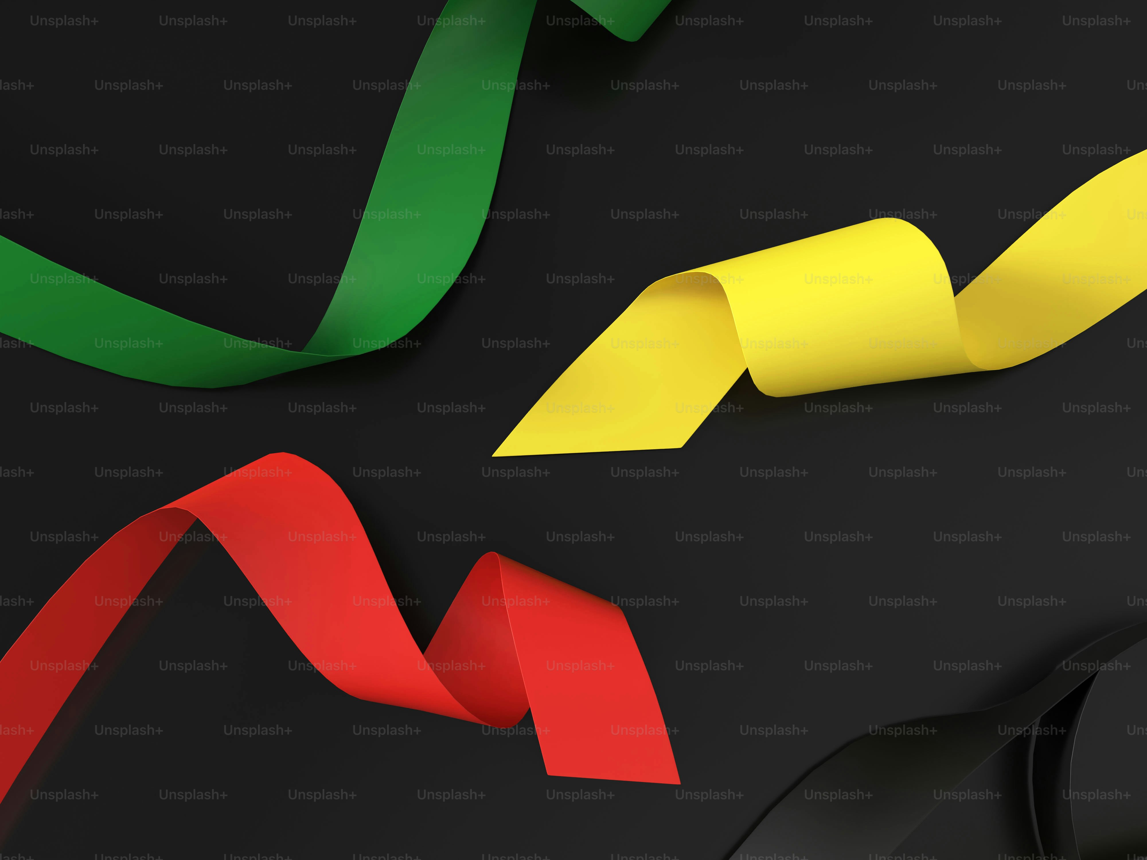 검은색 바탕에 빨강, 노랑, 초록, 검은색 리본이 그려져 있습니다