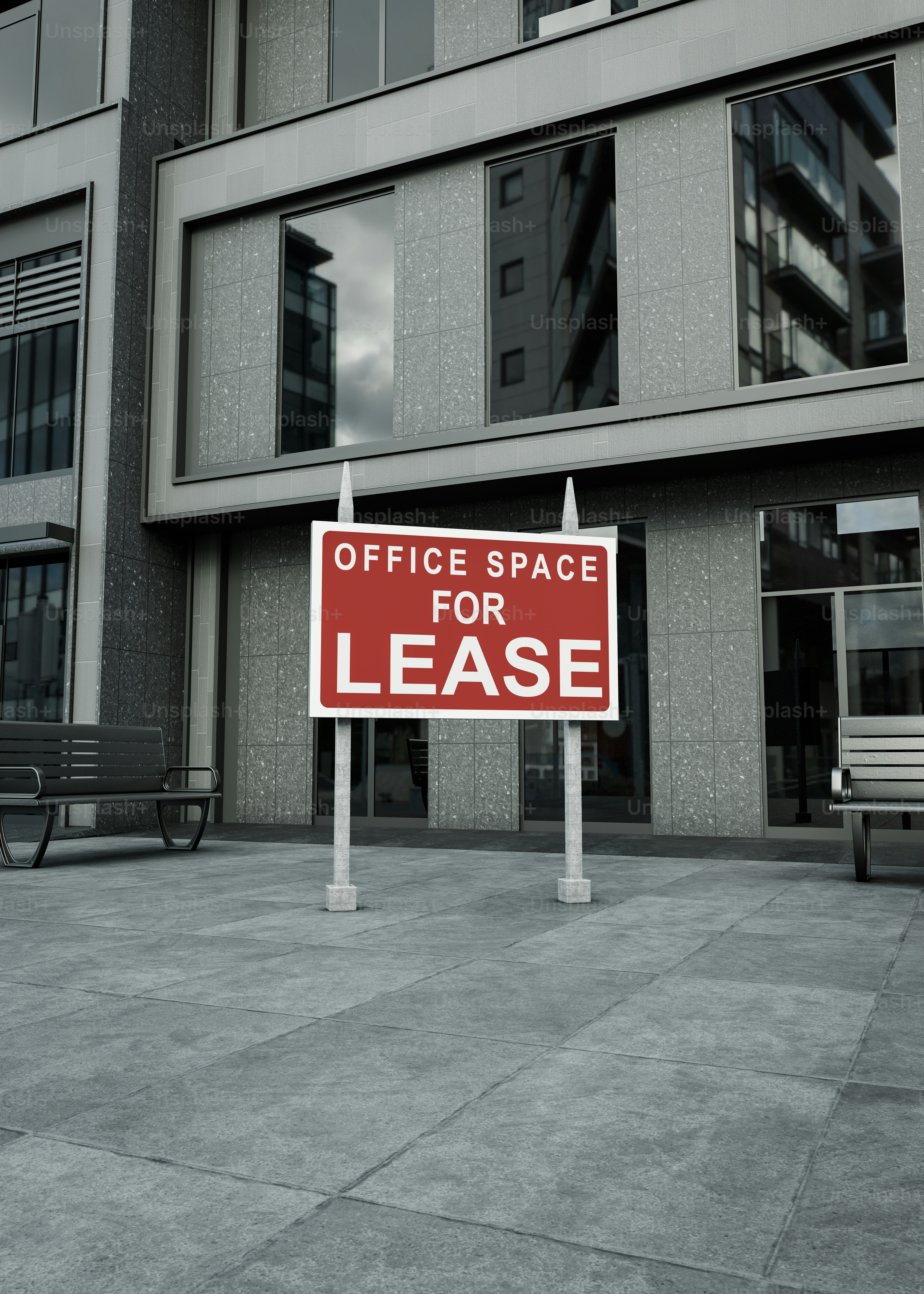 Office space for lease sign in front of building