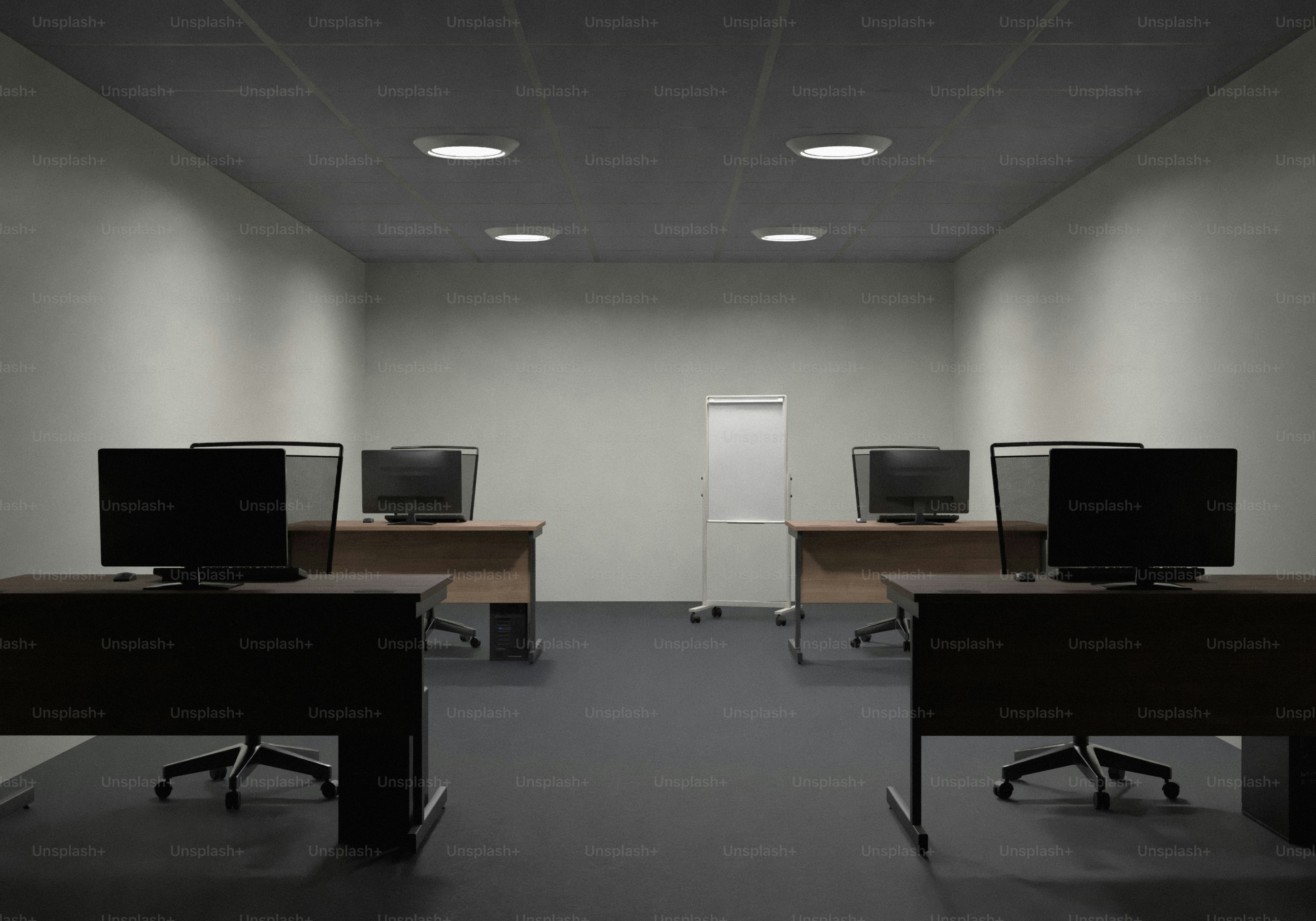 Empty office cubicles at night with one lit computer screen. photo ...