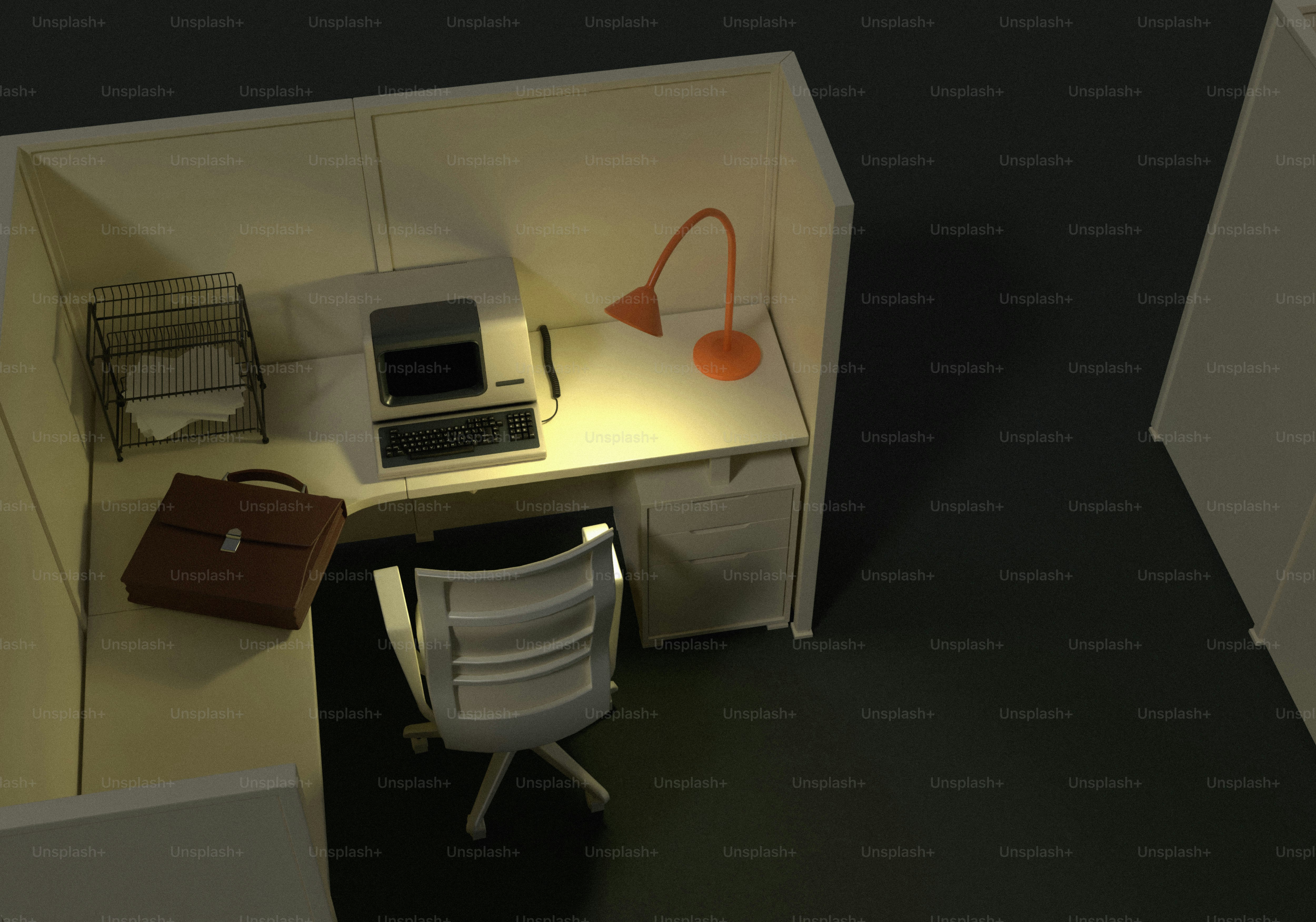 책상과 의자가 있는 빈 사무실 칸막이.