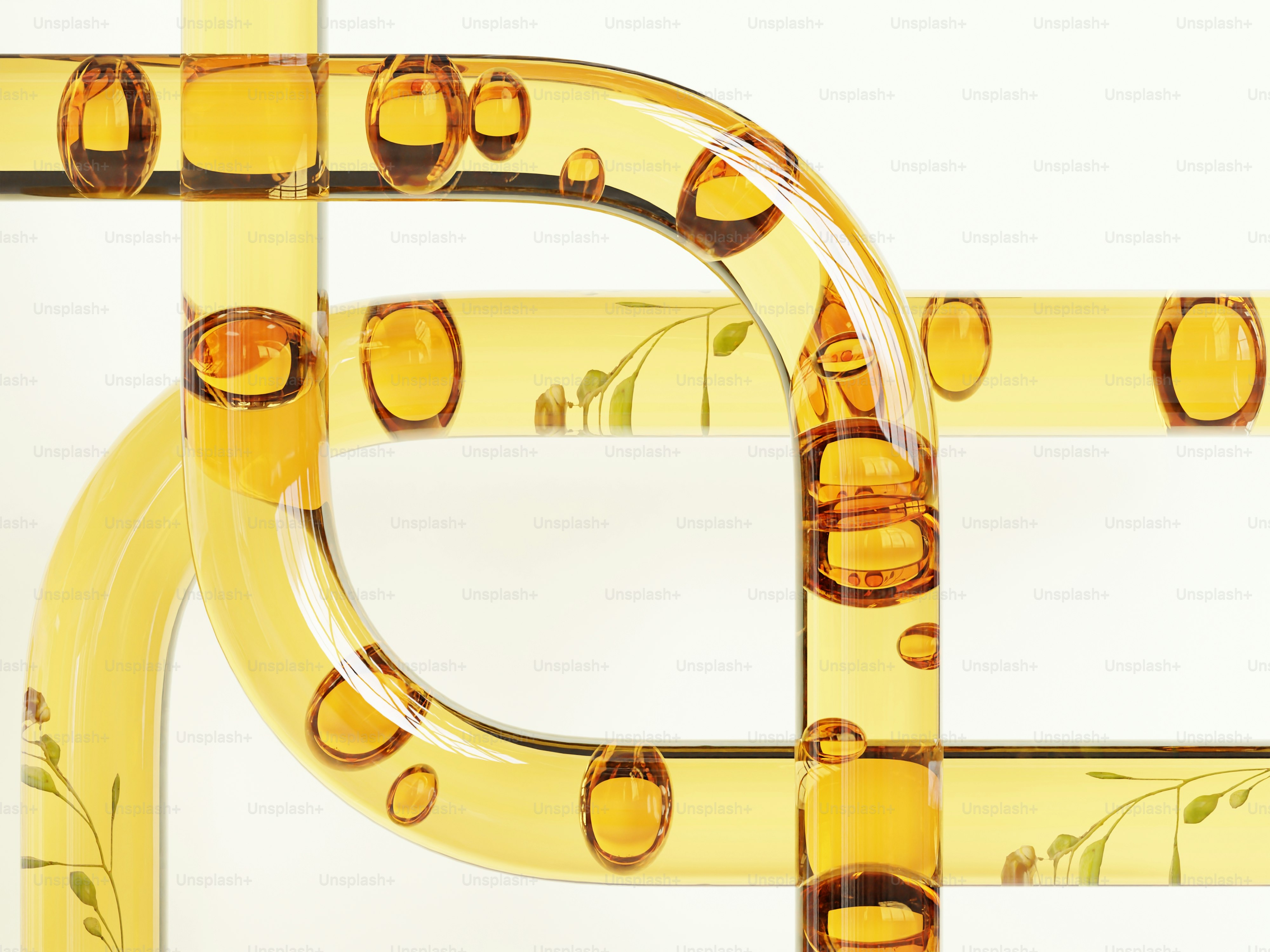 Yellow liquid with bubbles flowing through clear tubes