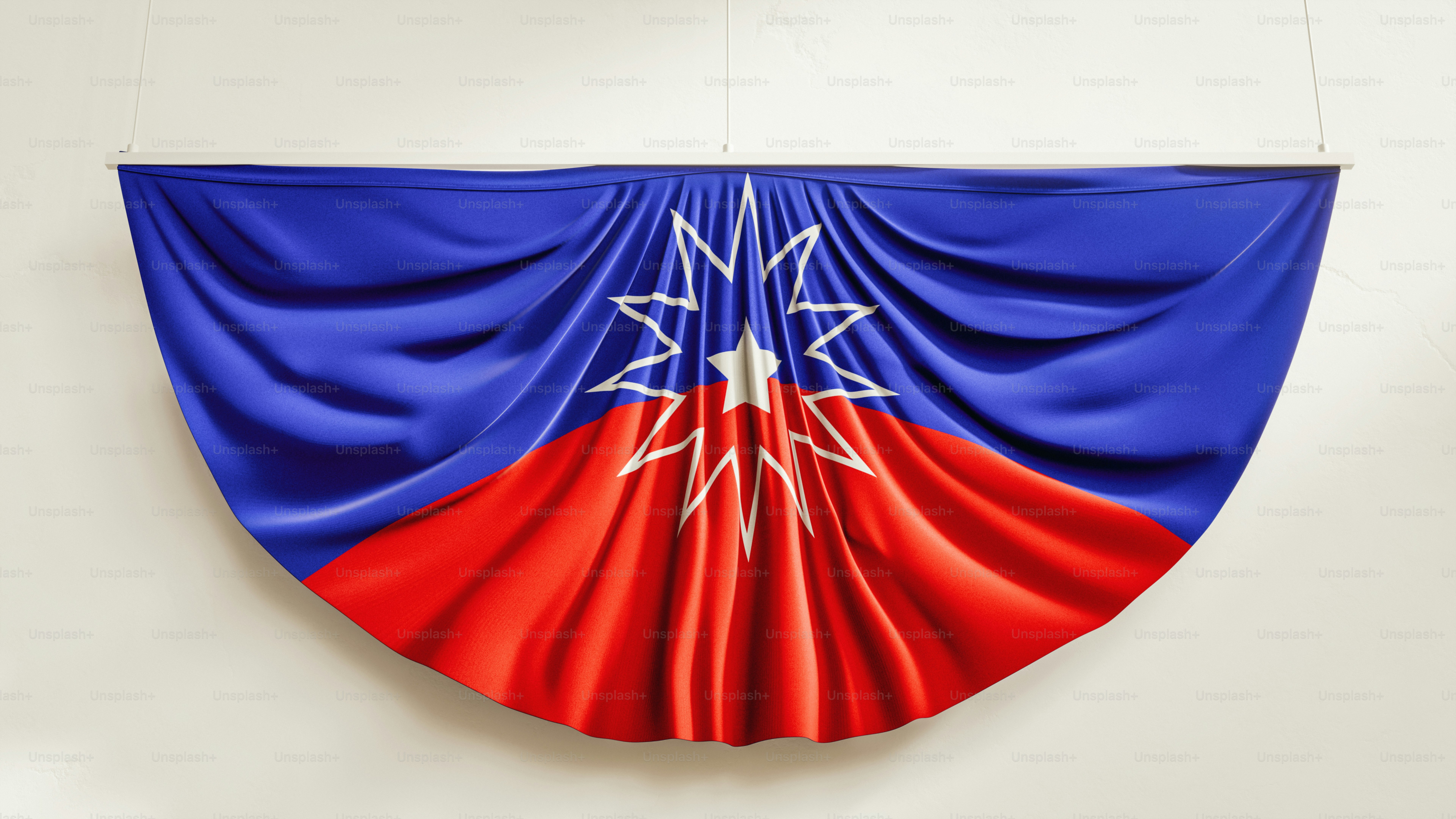 Una bandiera blu e rossa con una stella bianca