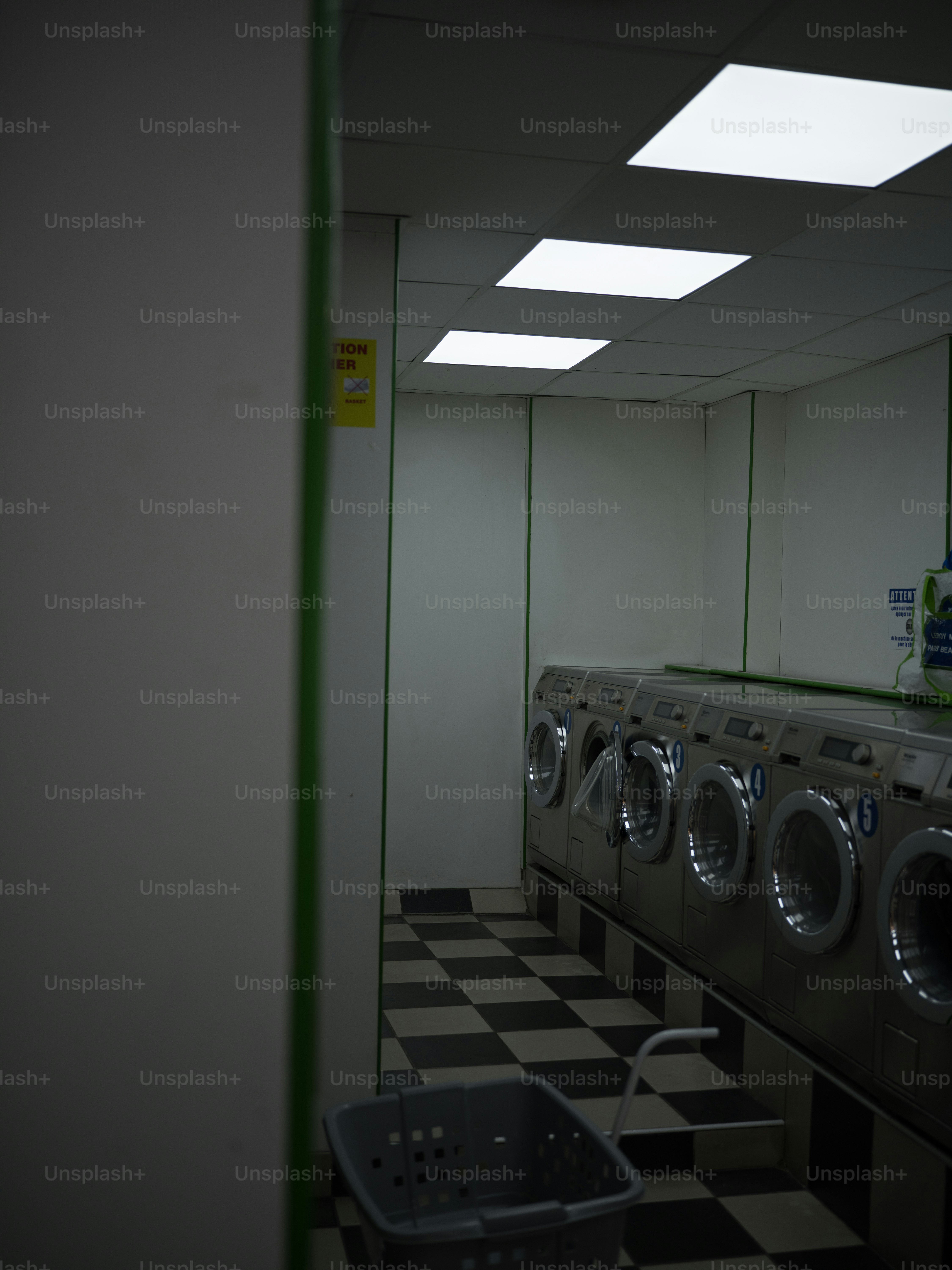 Row of washing machines in a laundromat